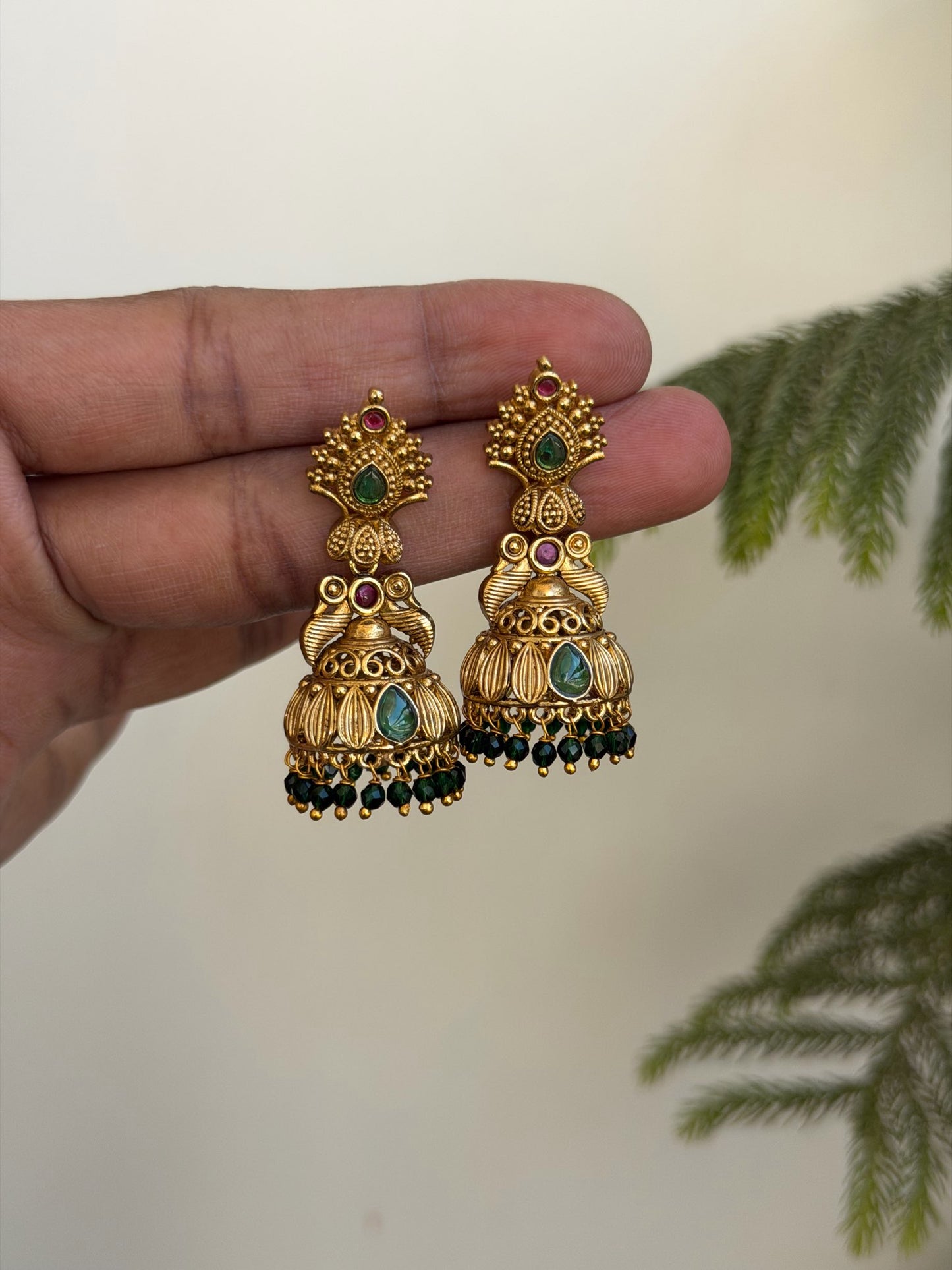 Traditional Antique Jhumka Earrings with Green and Red Stone Accents