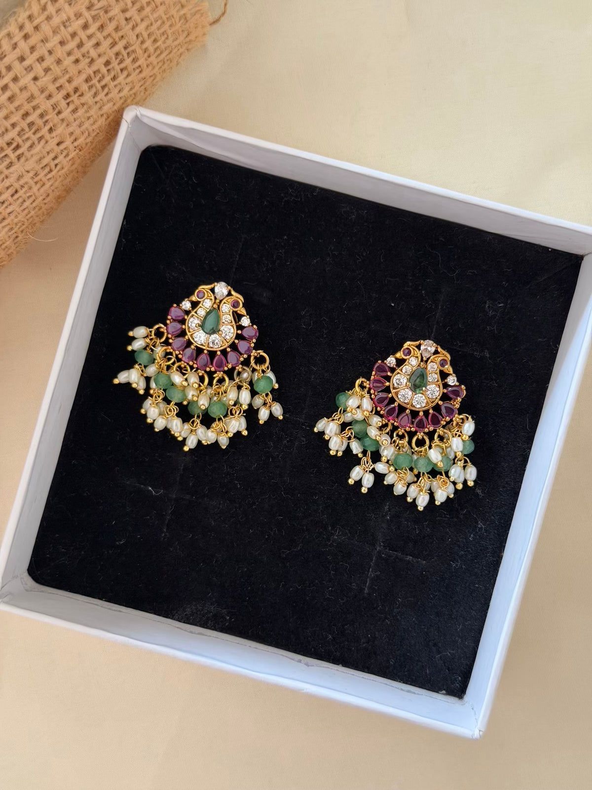 Twin Peacock Stud Earrings with Ruby Petals and Rice Pearl and Green Bead Drops