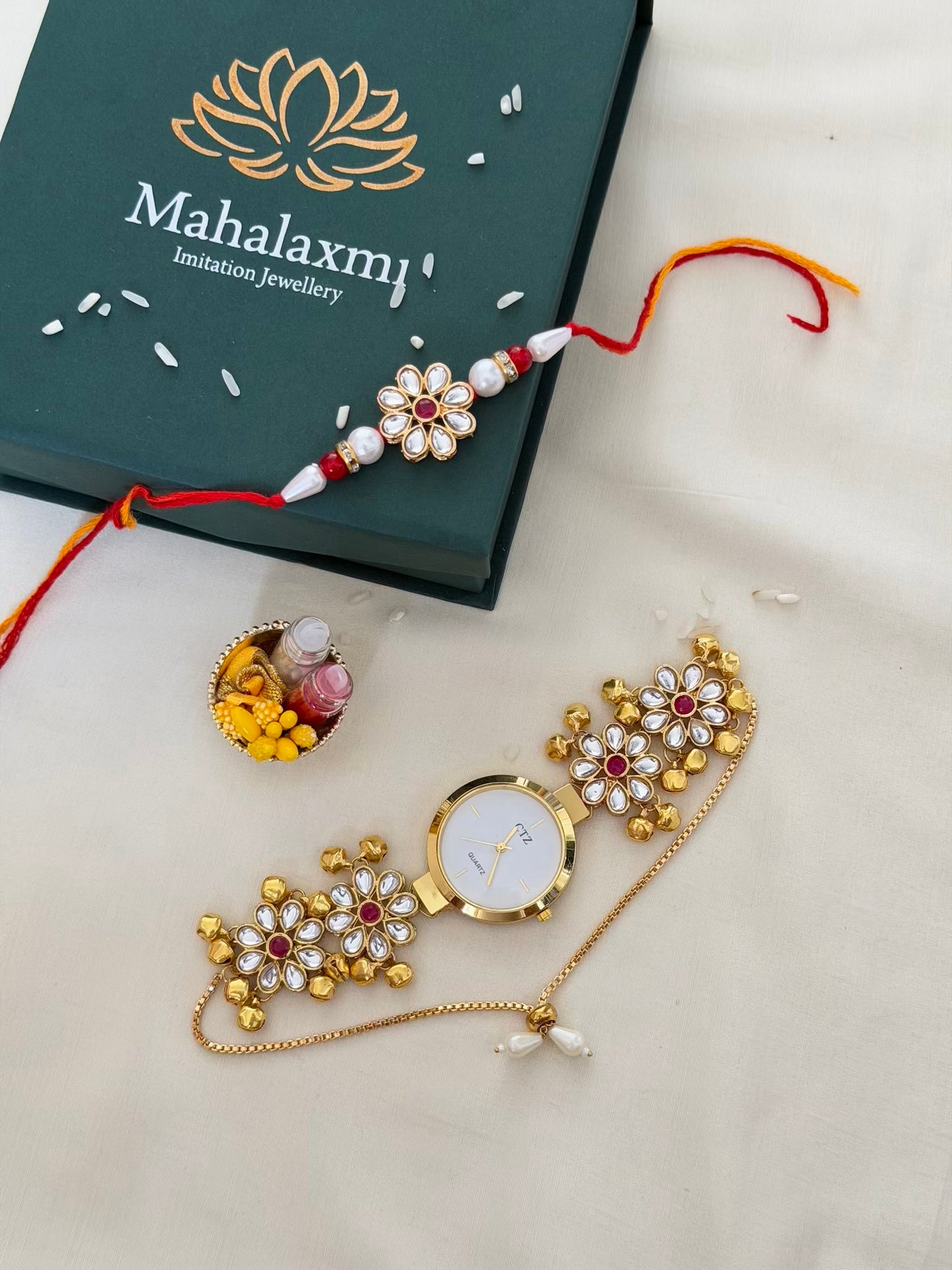 Red Kundan Meenakari Rakhi & White Dial Bracelet Watch Combo
