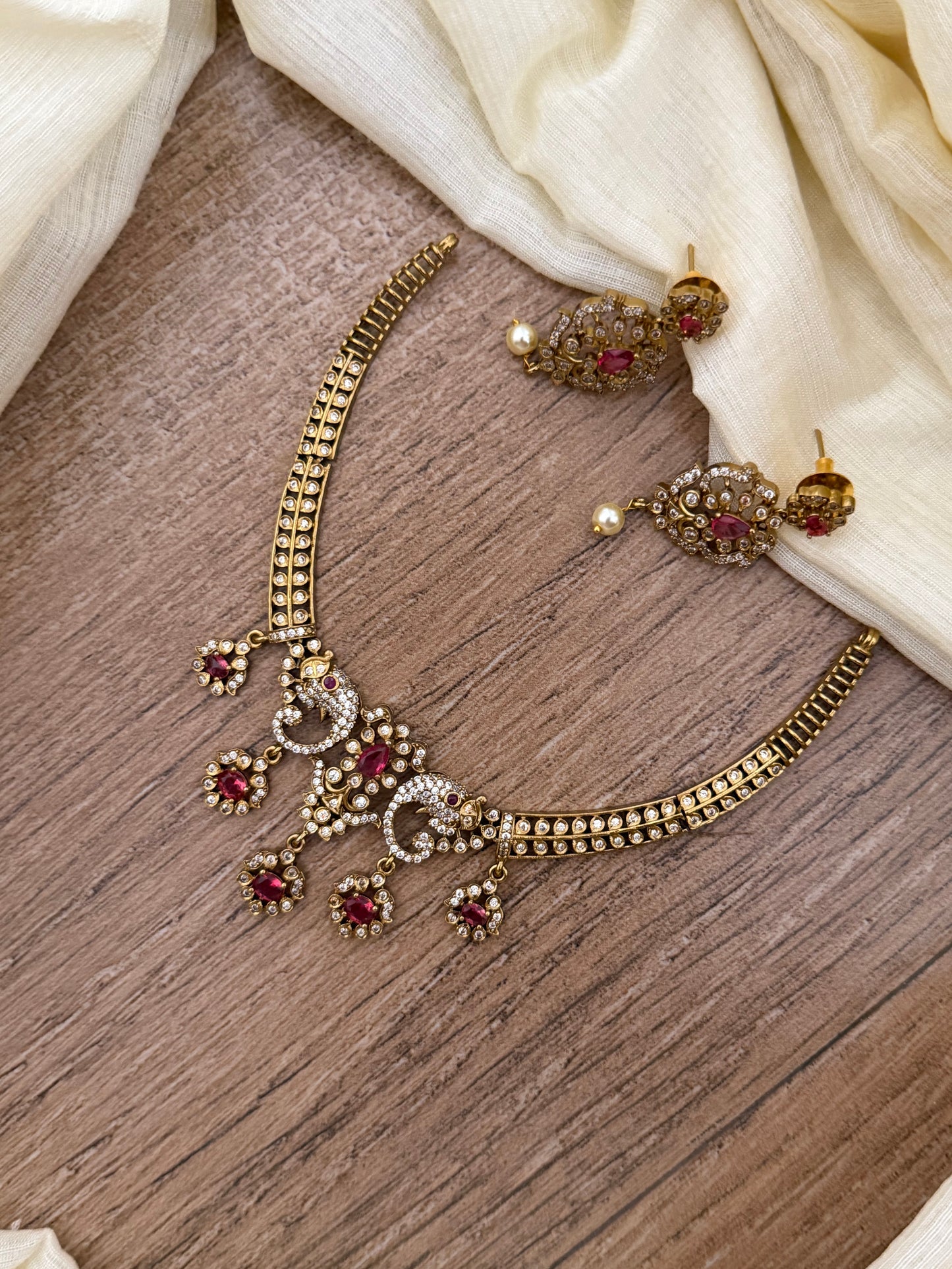 Antique Gold Finish Peacock Motif Kanti Choker Set