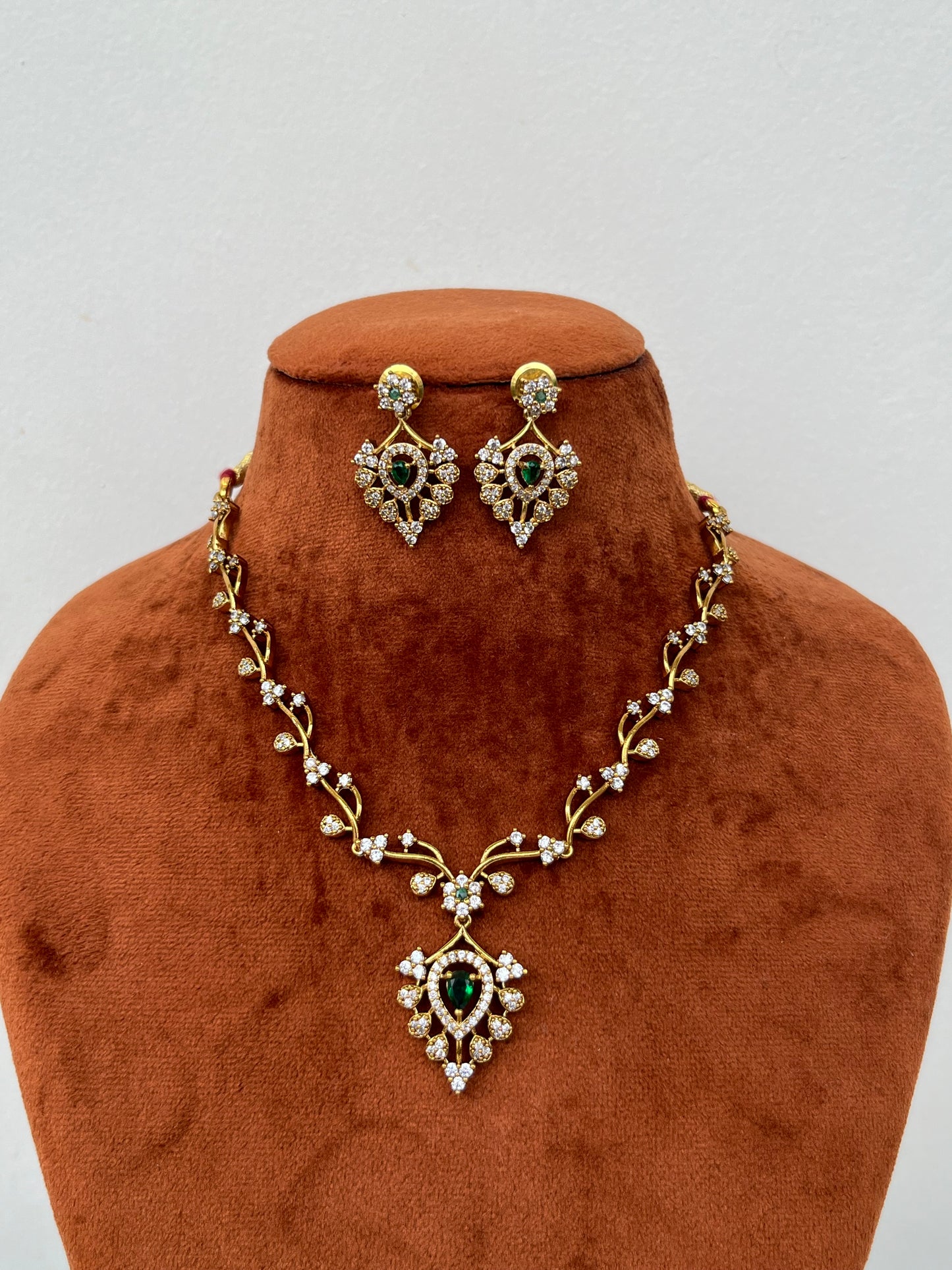 Sleek Green AD Necklace – Leaf Motifs – With Earrings