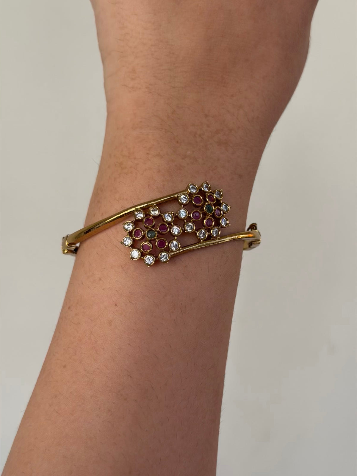 Double Floral CZ Open Bypass Bracelet with Ruby and Emerald Centres