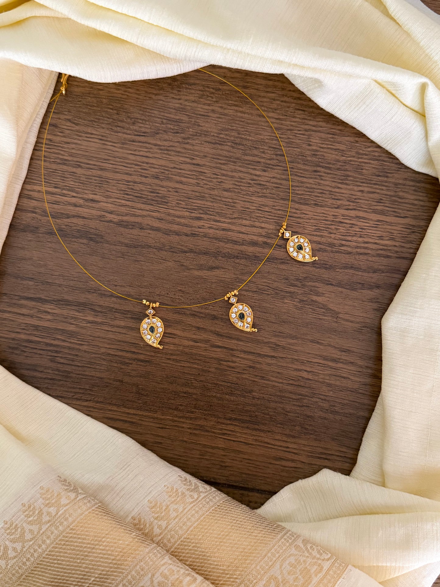 Minimalist Invisible Necklace with Mango Leaf Pendants