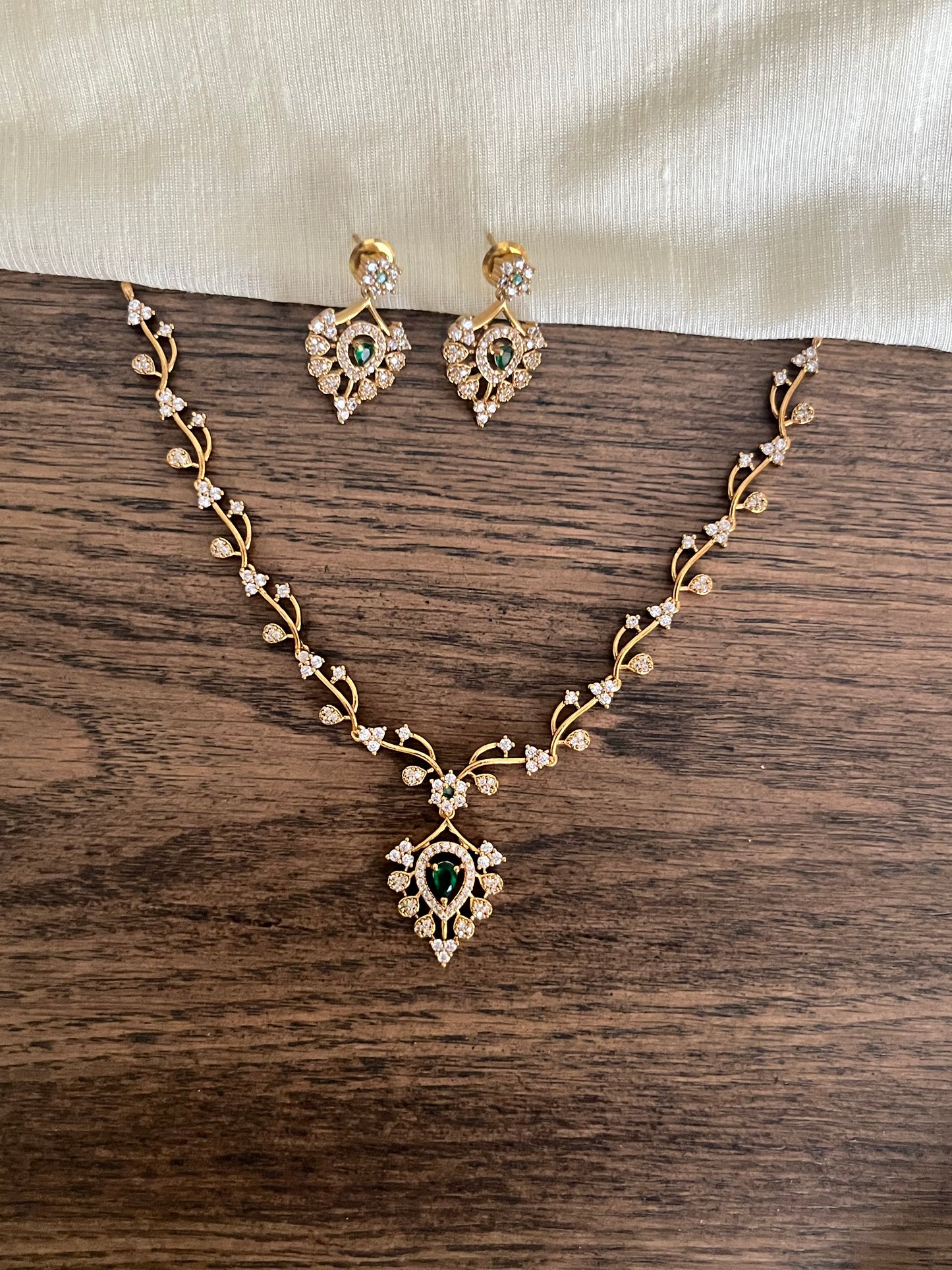 Sleek Green AD Necklace – Leaf Motifs – With Earrings