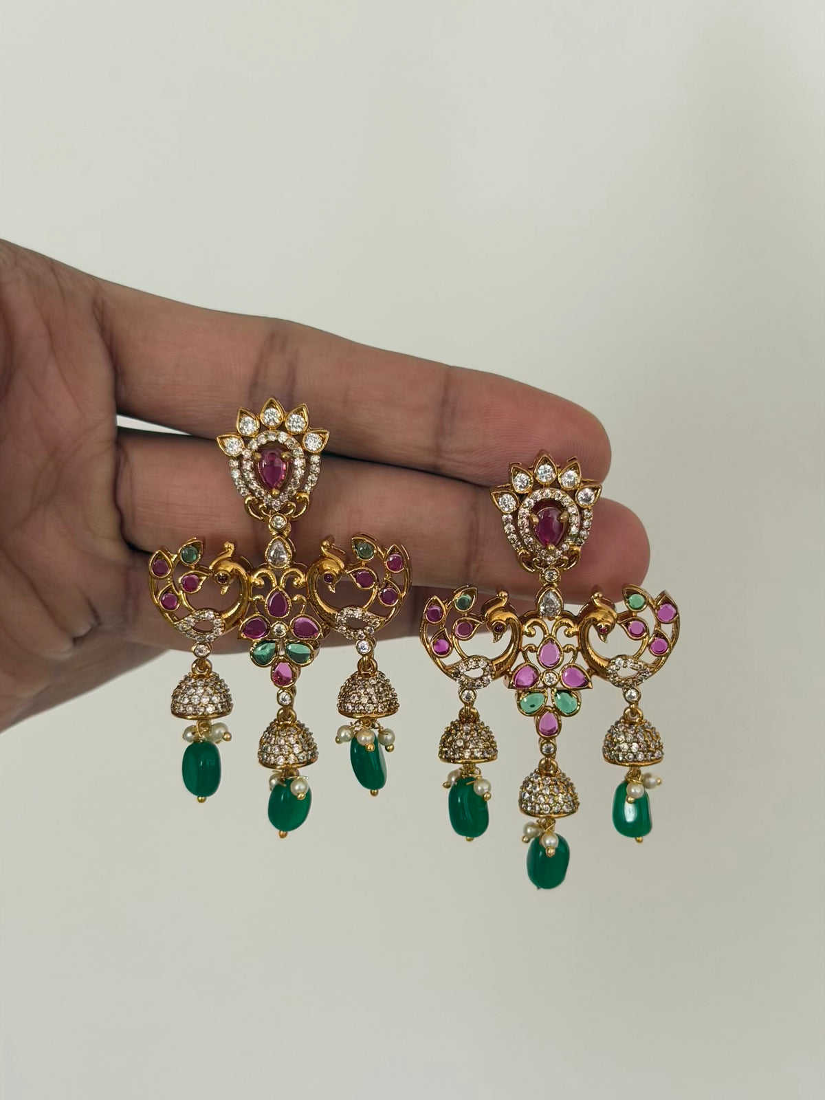 Twin Peacock Triple Jhumka Dangler Earrings with Ruby Emerald Stones and Green Bead Drops