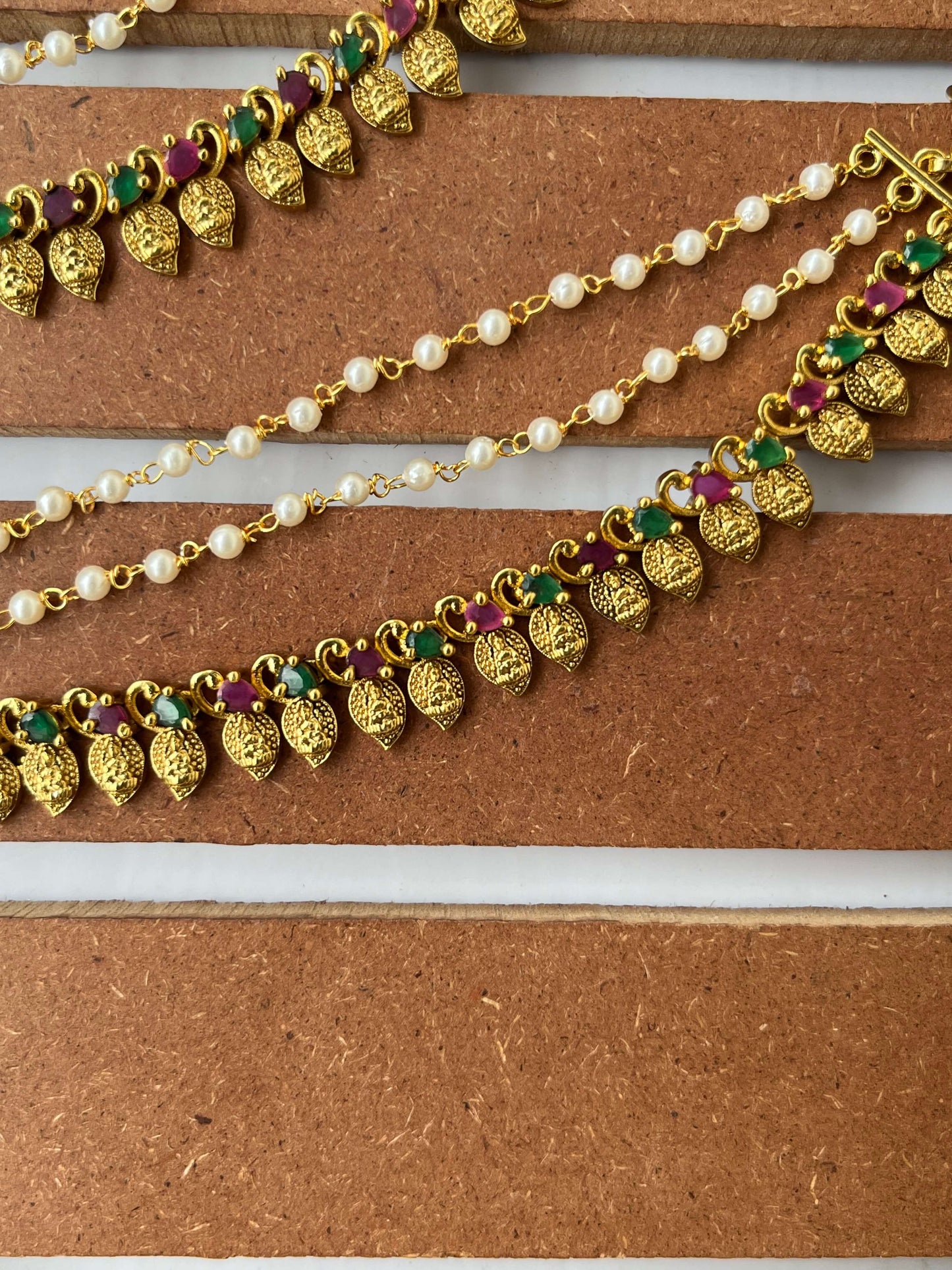 Mango Leaf Lakshmi Devi Ear Chain with Pearls, Ruby & Green Stones