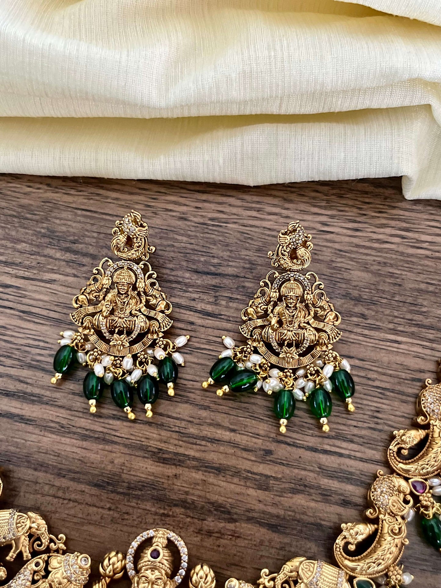 3D Grand Lakshmi Devi Antique Gold Necklace Set with Temple Design & Green Beads