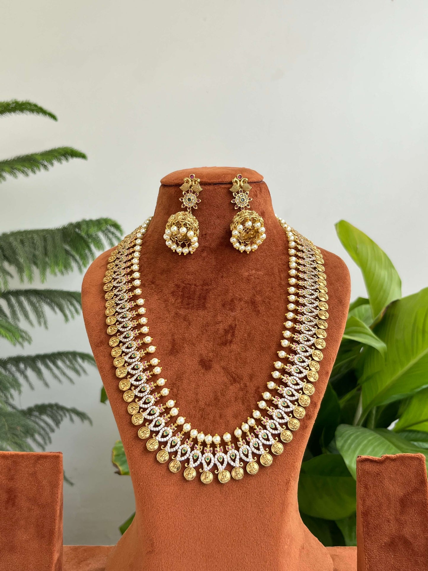 Nakshi Polish Mango Leaf Lakshmi Devi Coin Haram cum Vaddanam with Pearls & Jhumkas