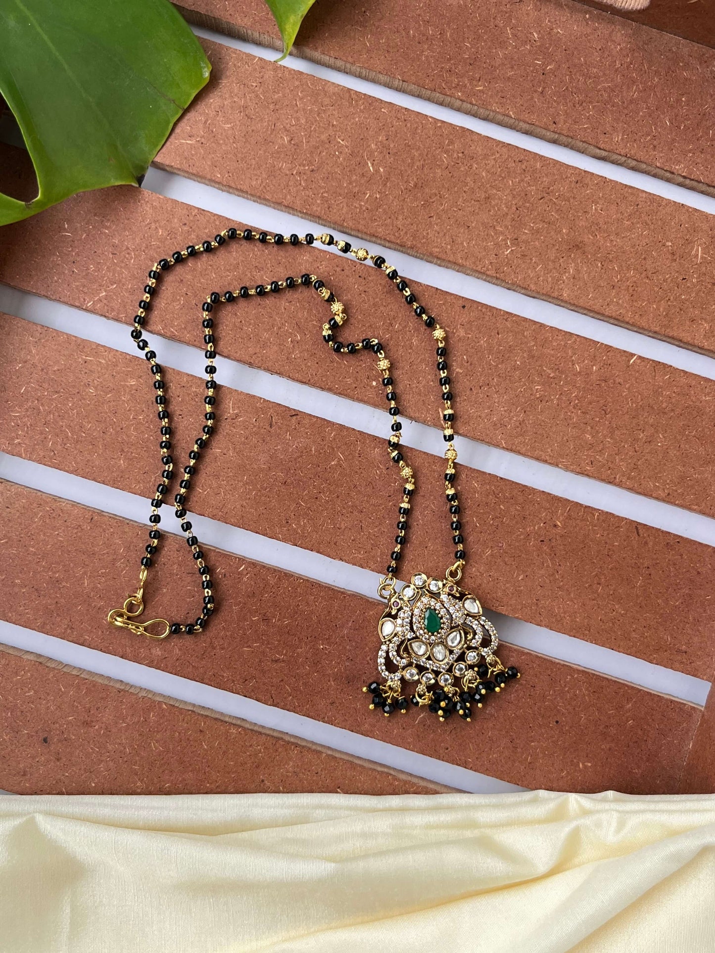 Medium Length Kundan Mangalsutra with Red & Green Stone Variants
