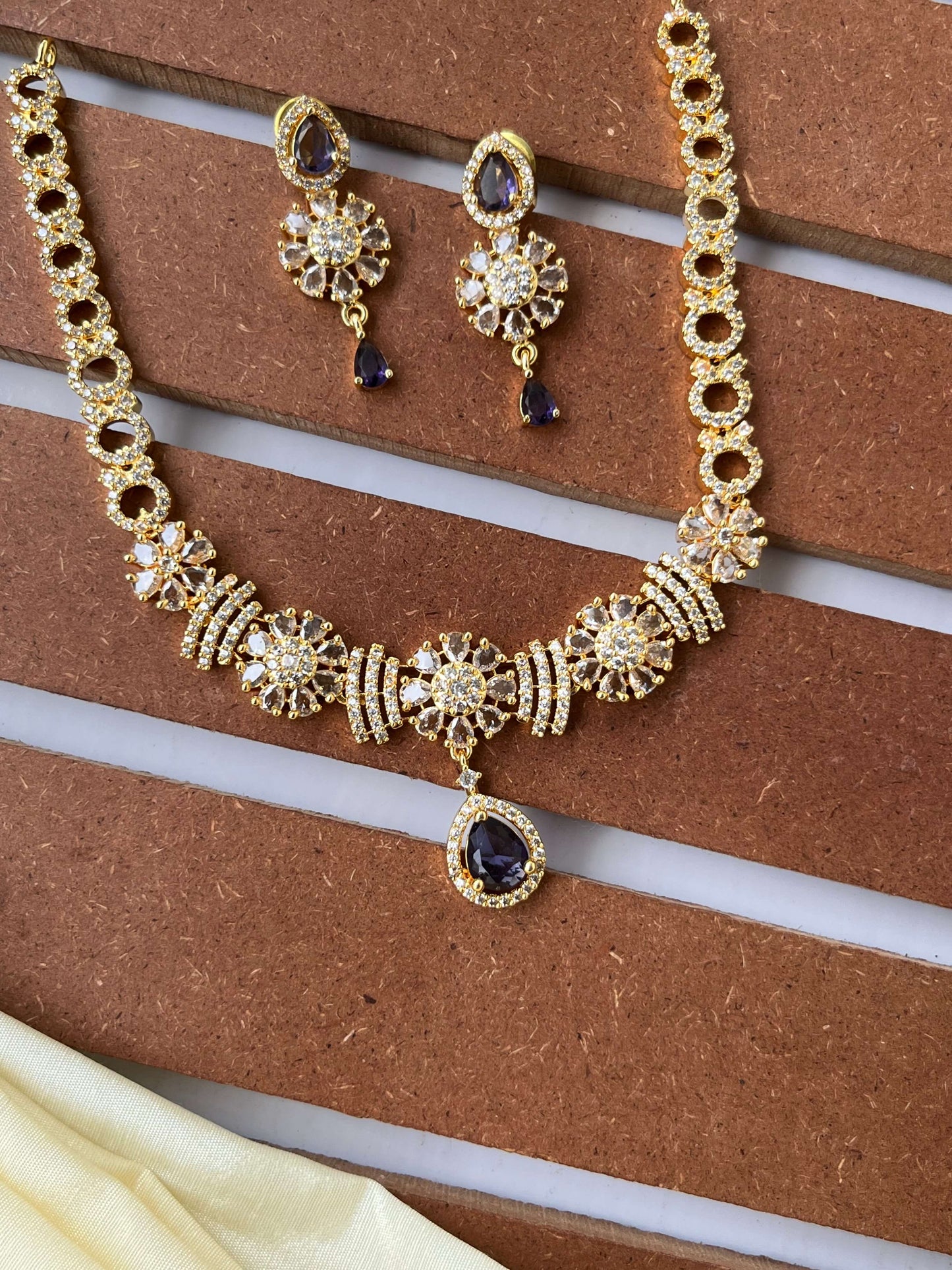 Golden Polish Floral Motif Necklace Set – Available in Purple & Emerald Green Variants