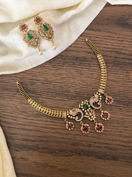 Antique Gold Finish Peacock Motif Kanti Choker Set with Ruby & Emerald Stones