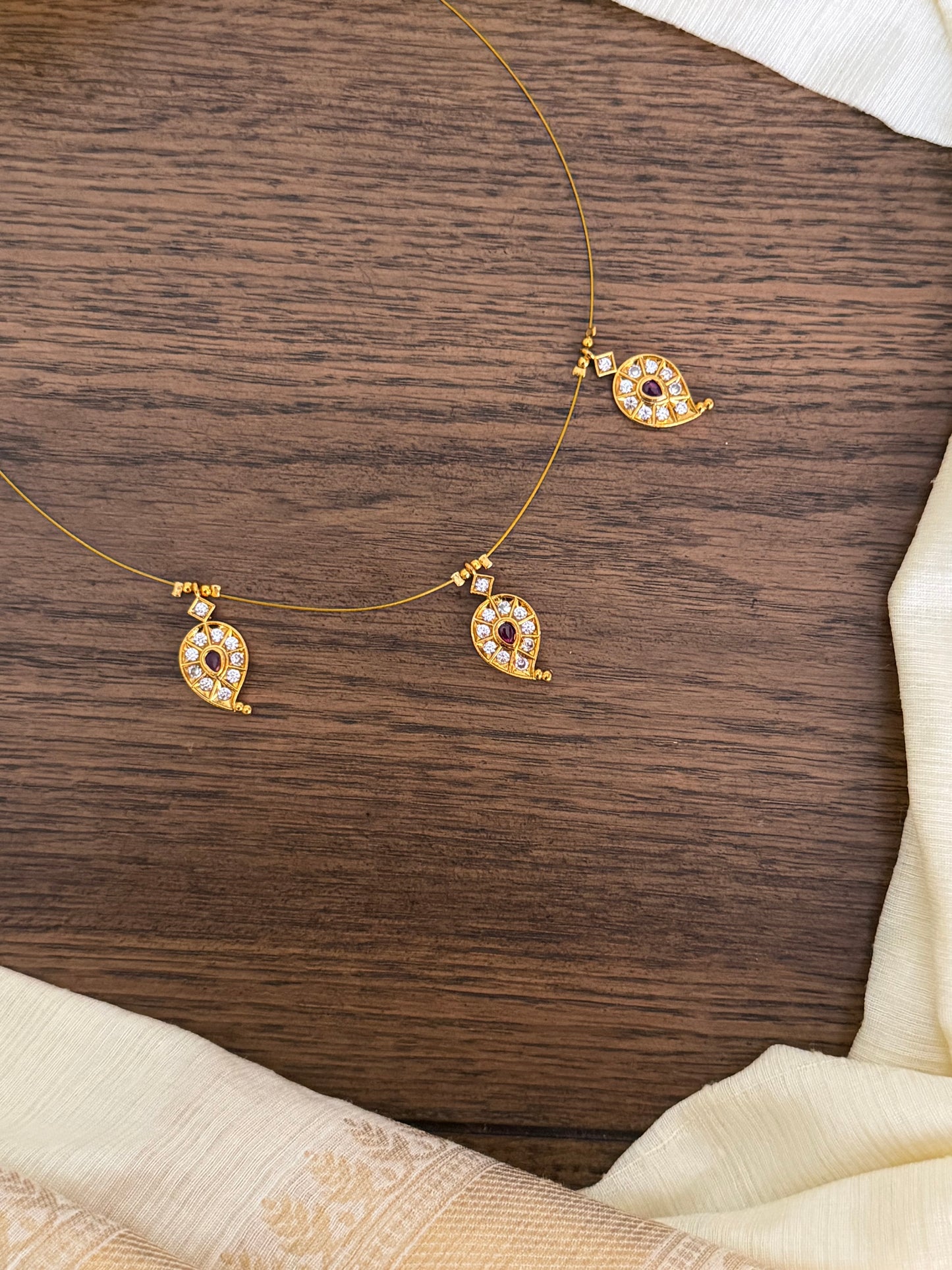 Minimalist Invisible Necklace with Mango Leaf Pendants