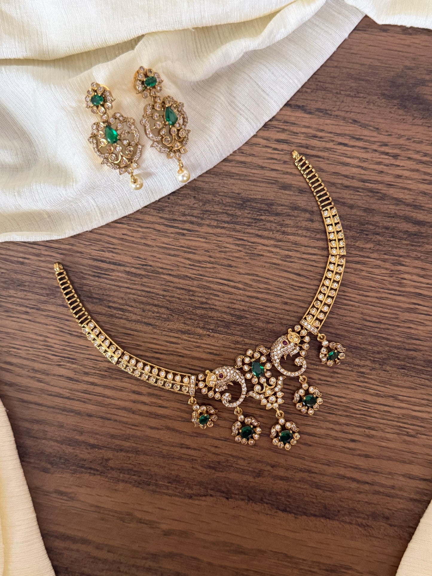 Antique Gold Finish Peacock Motif Kanti Choker Set