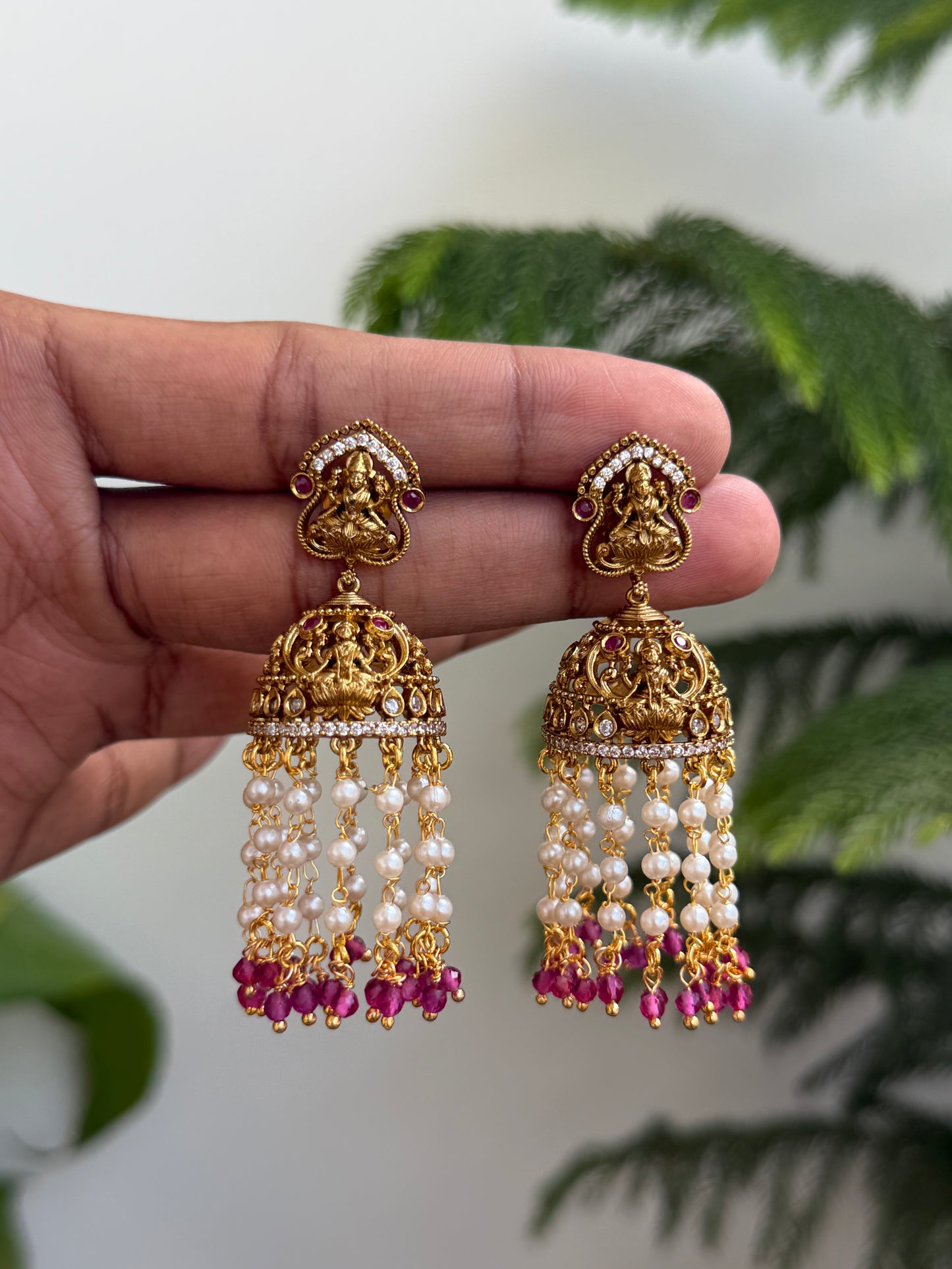 Antique Gold Lakshmi Temple Jhumkas with Pearl & Emerald Tassel Drops