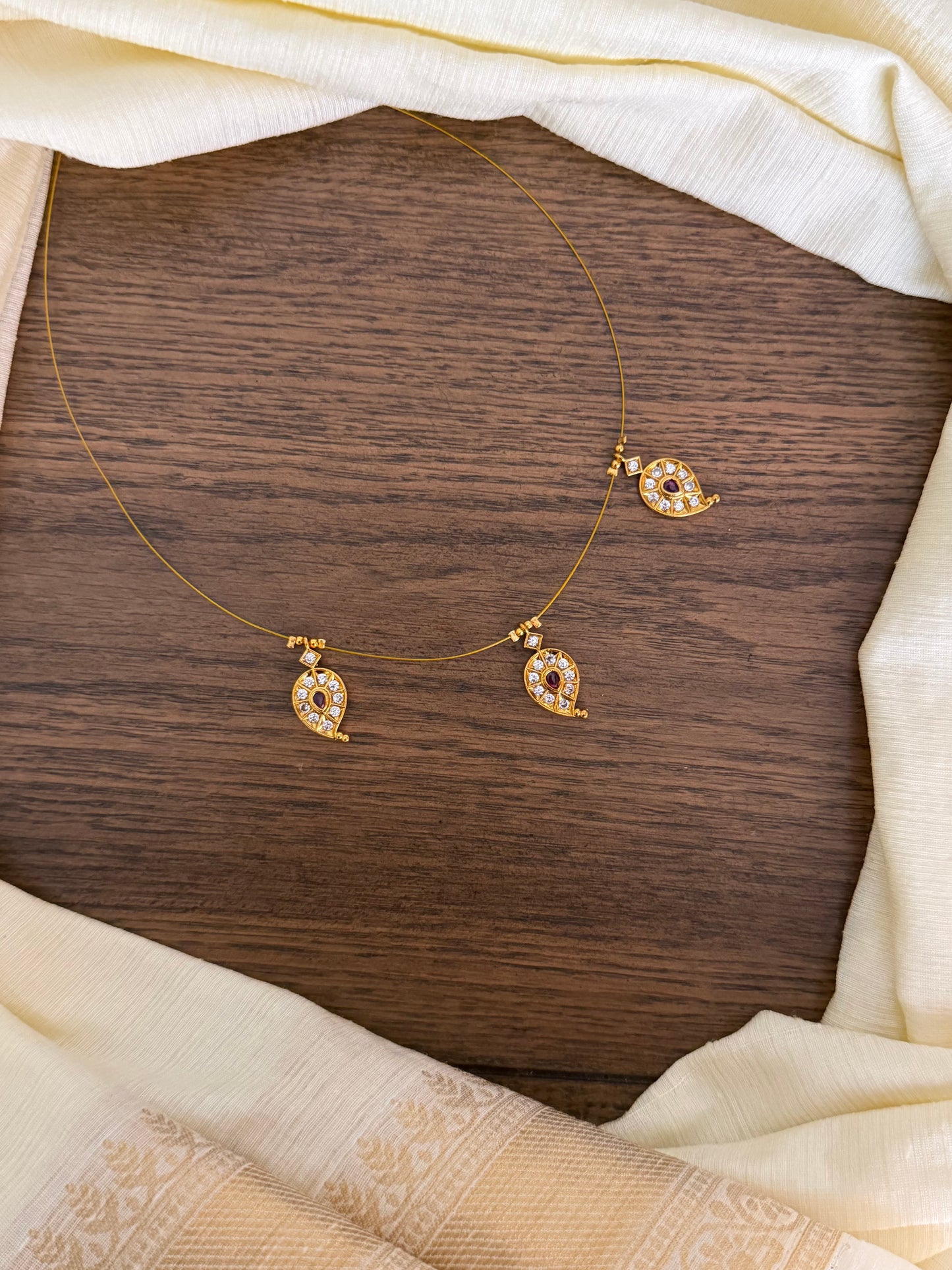 Minimalist Invisible Necklace with Mango Leaf Pendants