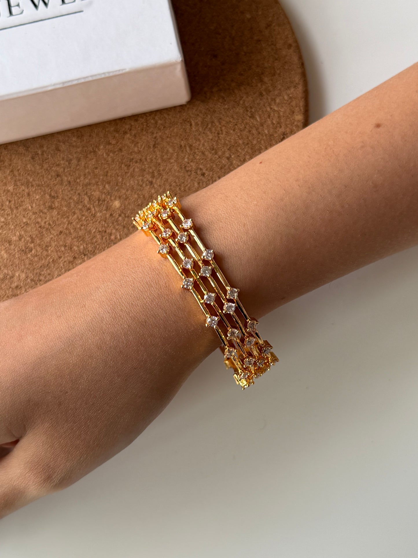 Sleek CZ Stone Bangle Set of 4 with Premium Gold-Tone Plating