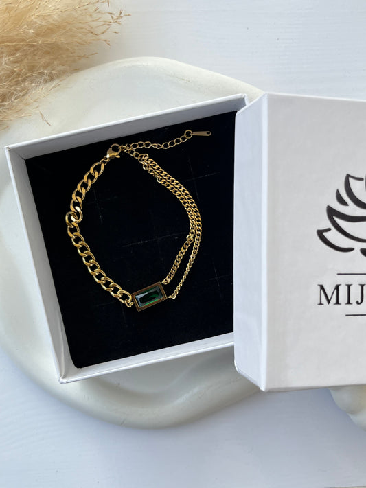 Dual-chain gold bracelet featuring a bold rectangular green enamel centerpiece and anti-tarnish finish — a modern, unisex accessory perfect for gifting or personal style.