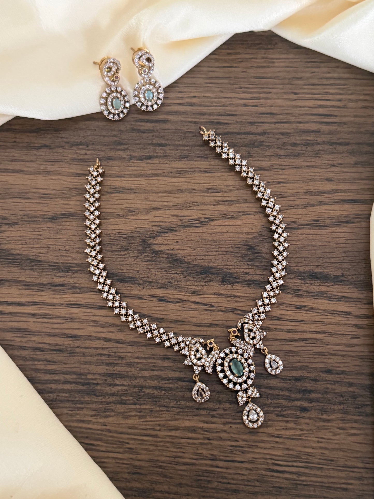 Sleek CZ Peacock Motif Necklace Set