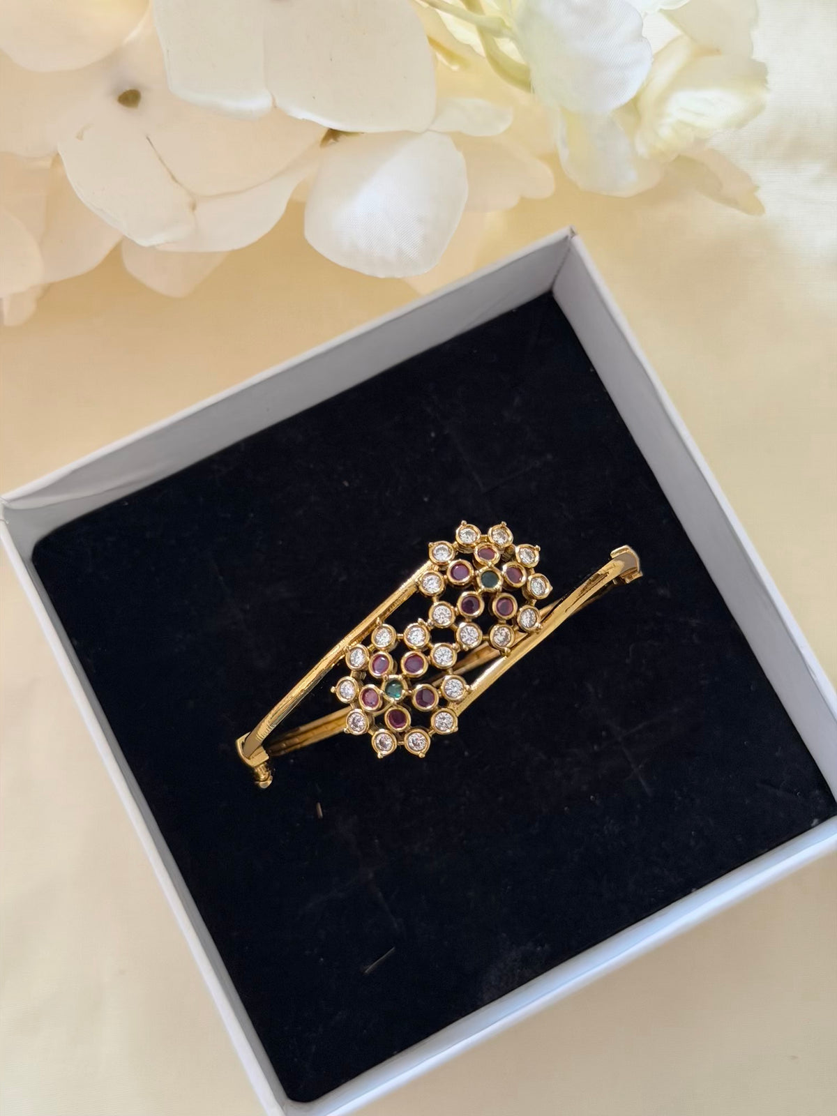 Double Floral CZ Open Bypass Bracelet with Ruby and Emerald Centres