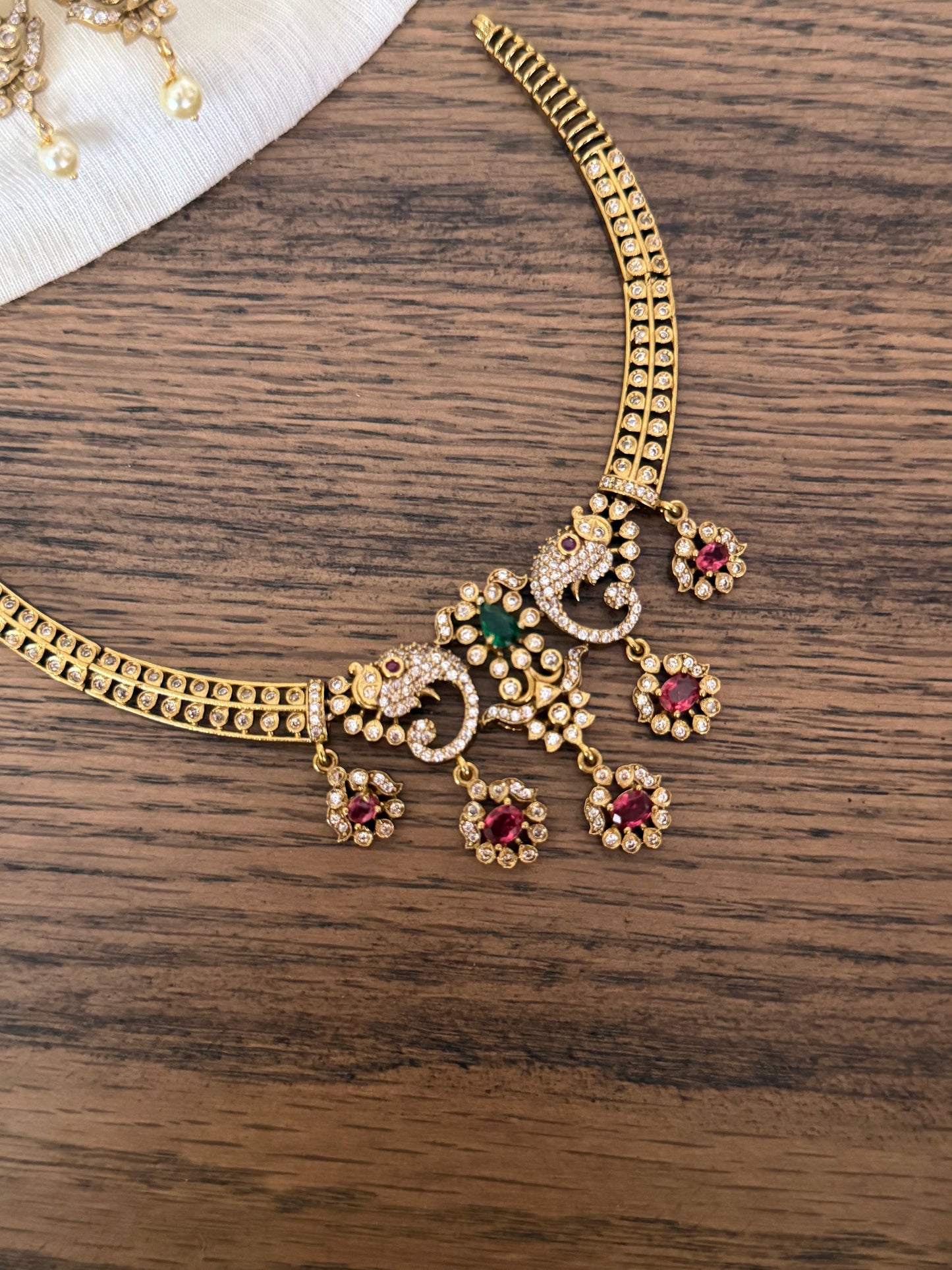 Antique Gold Finish Peacock Motif Kanti Choker Set
