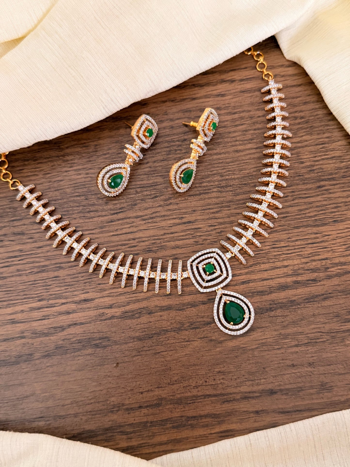 Designer Geometric CZ Diamond Necklace Set with Emerald Accents