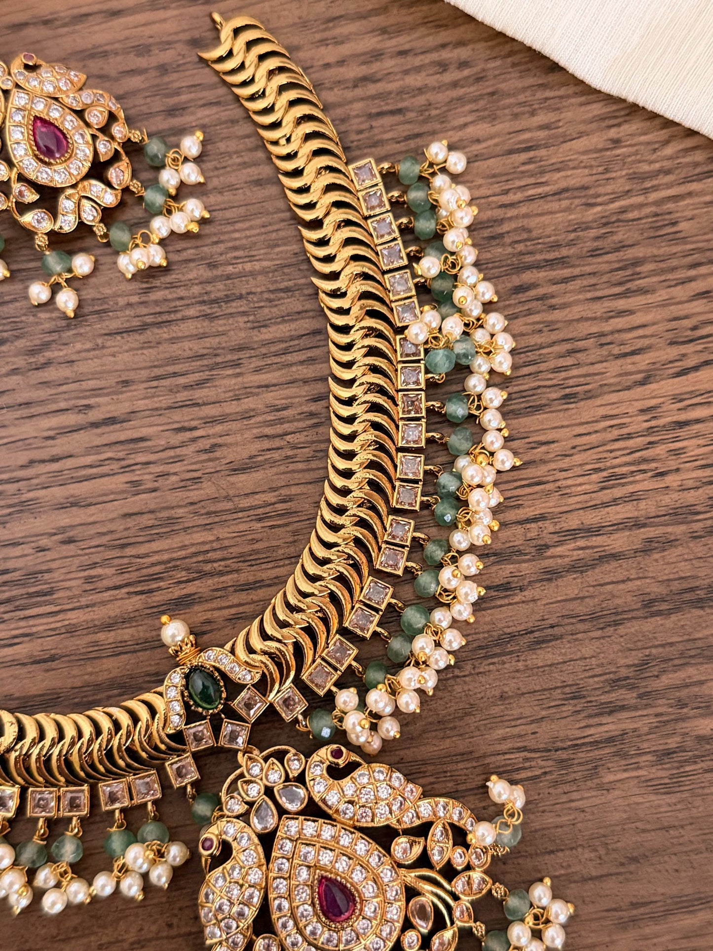 Traditional Jalebi Design Necklace Set with Ruby & Emerald Stones