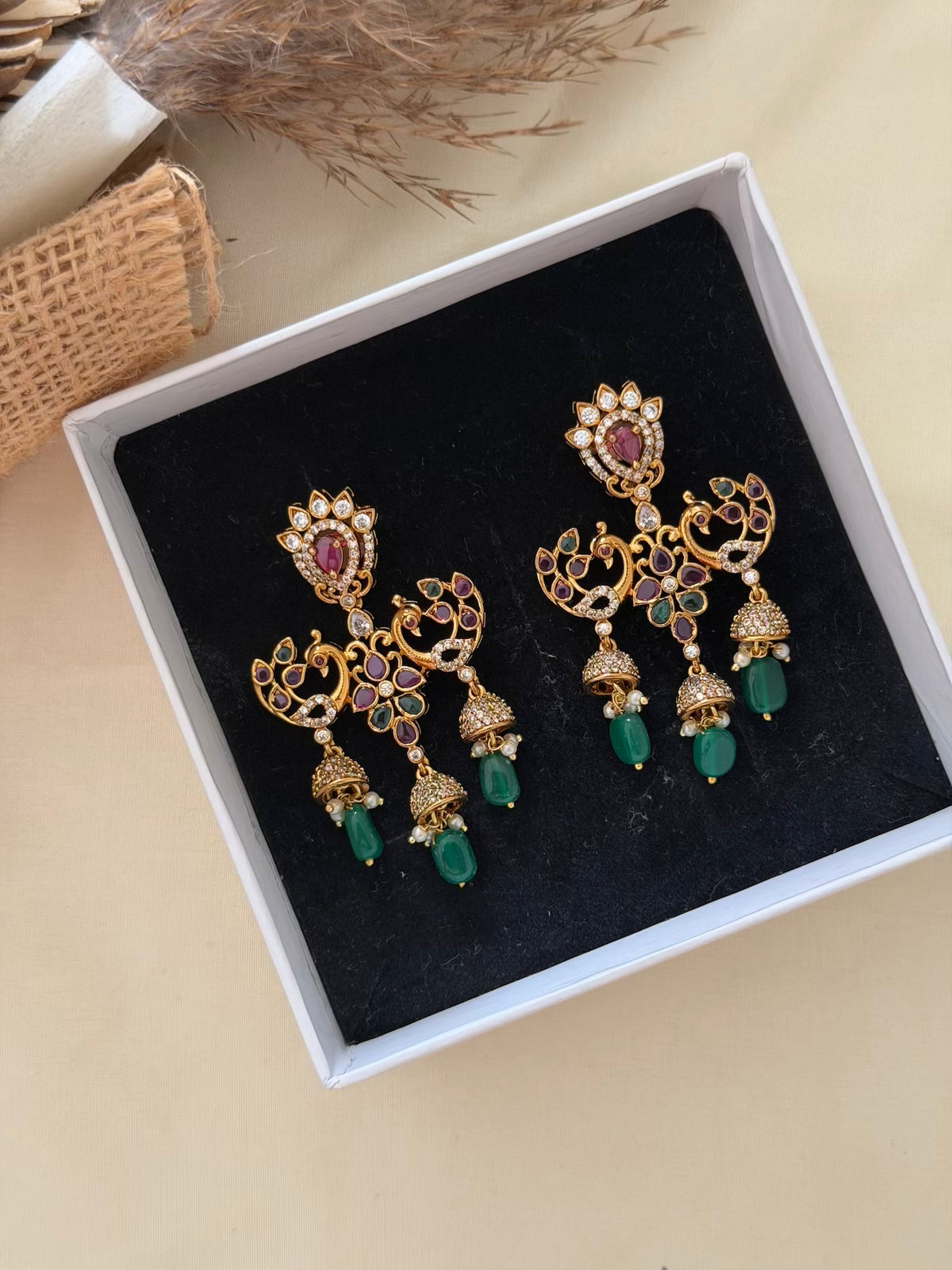 Twin Peacock Triple Jhumka Dangler Earrings with Ruby Emerald Stones and Green Bead Drops
