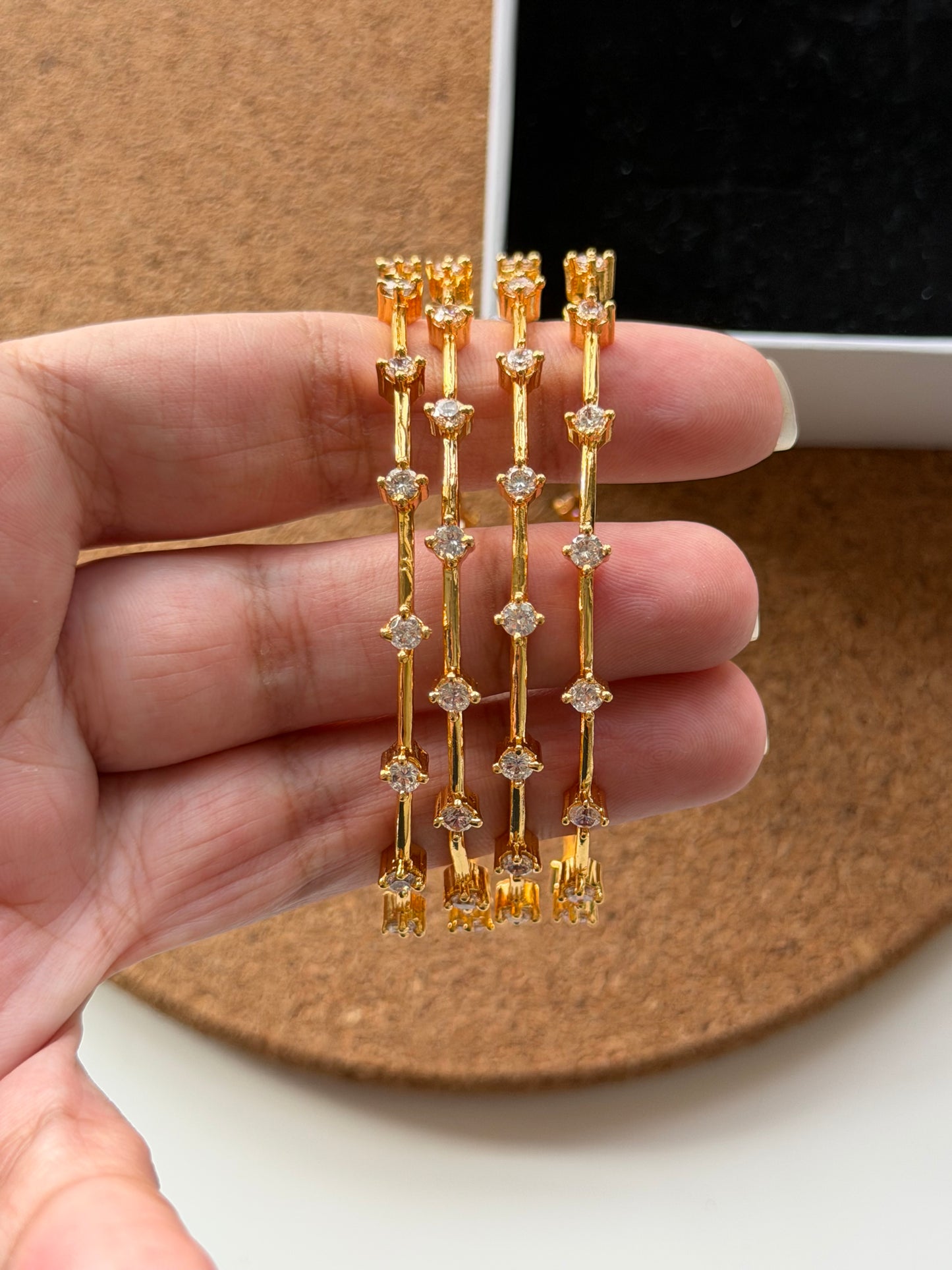 Sleek CZ Stone Bangle Set of 4 with Premium Gold-Tone Plating