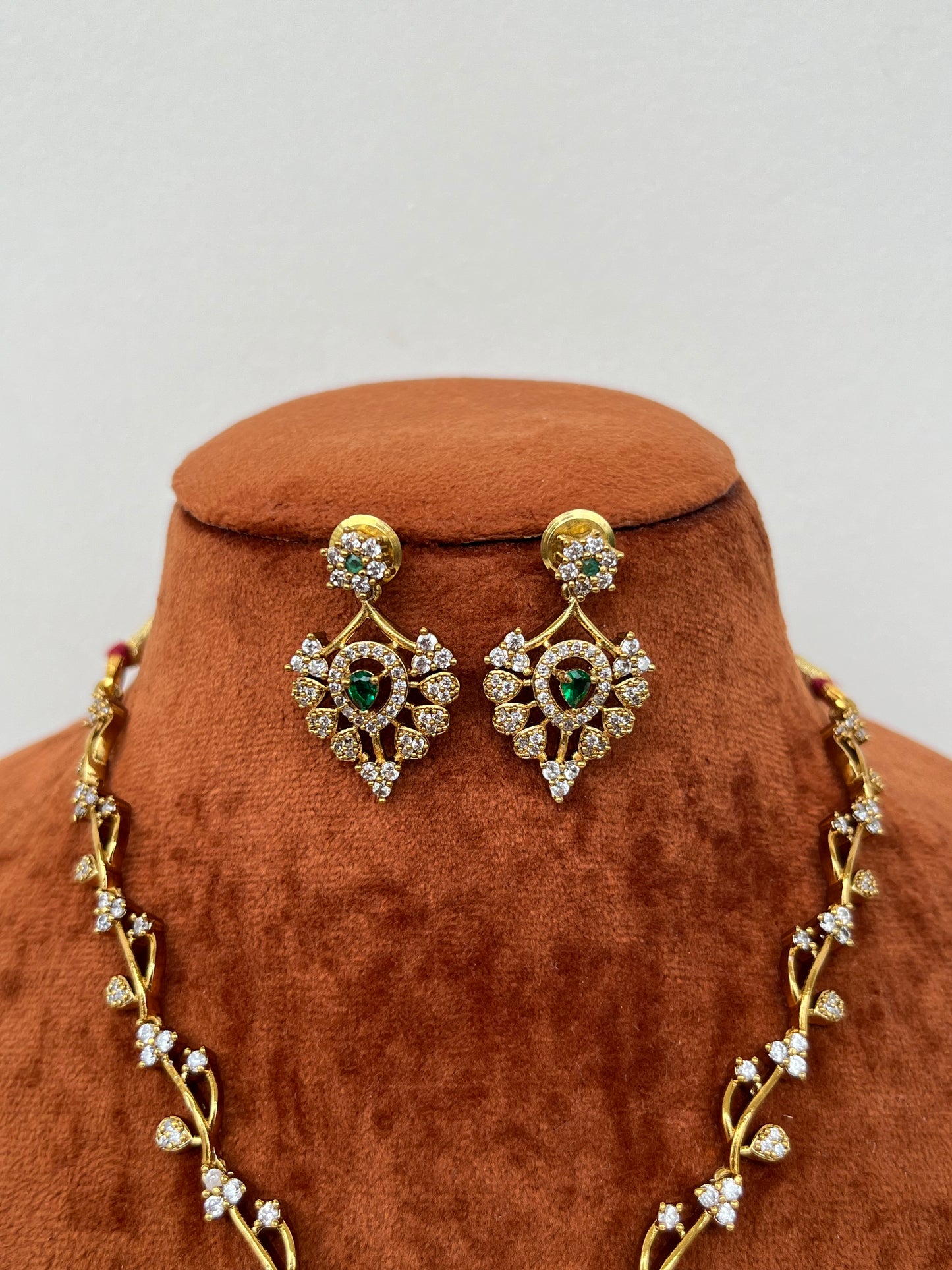 Sleek Green AD Necklace – Leaf Motifs – With Earrings