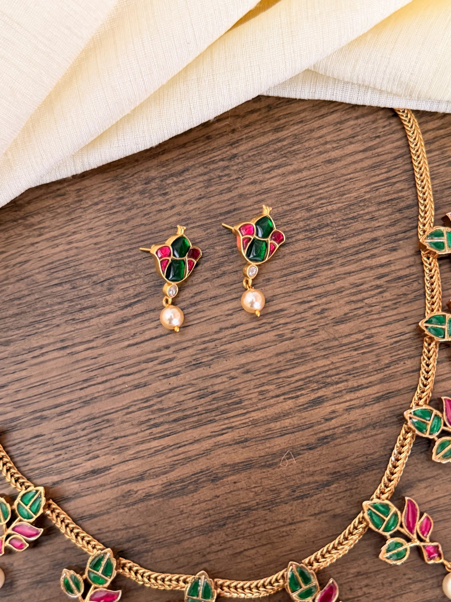 Handcrafted Jadau Kundan Necklace Set with Emerald & Ruby Leaf Motifs
