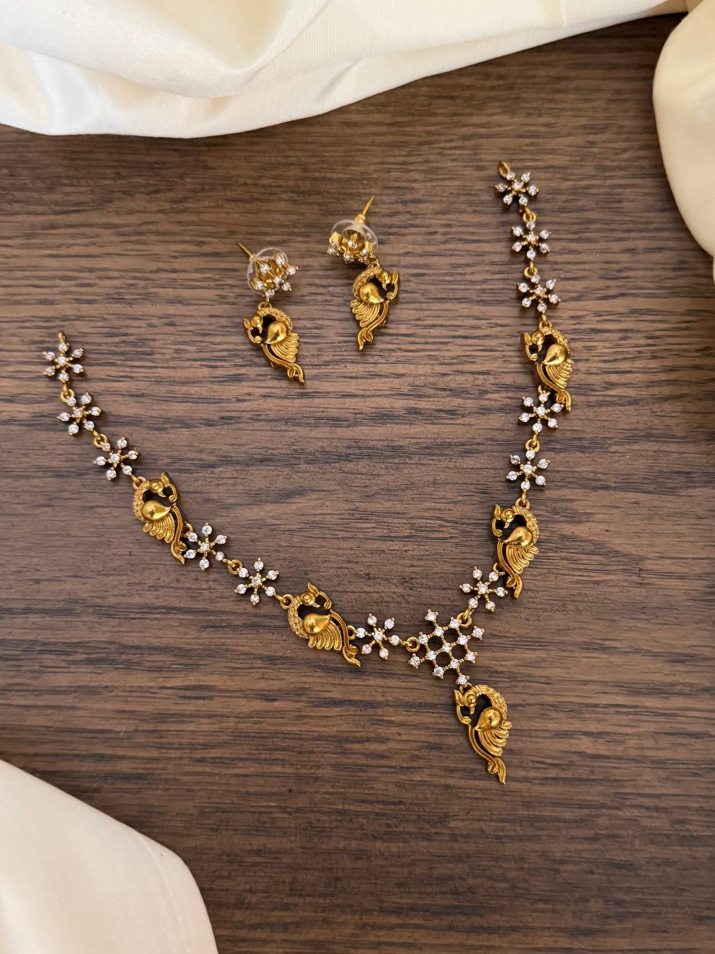 AD peacock necklace set