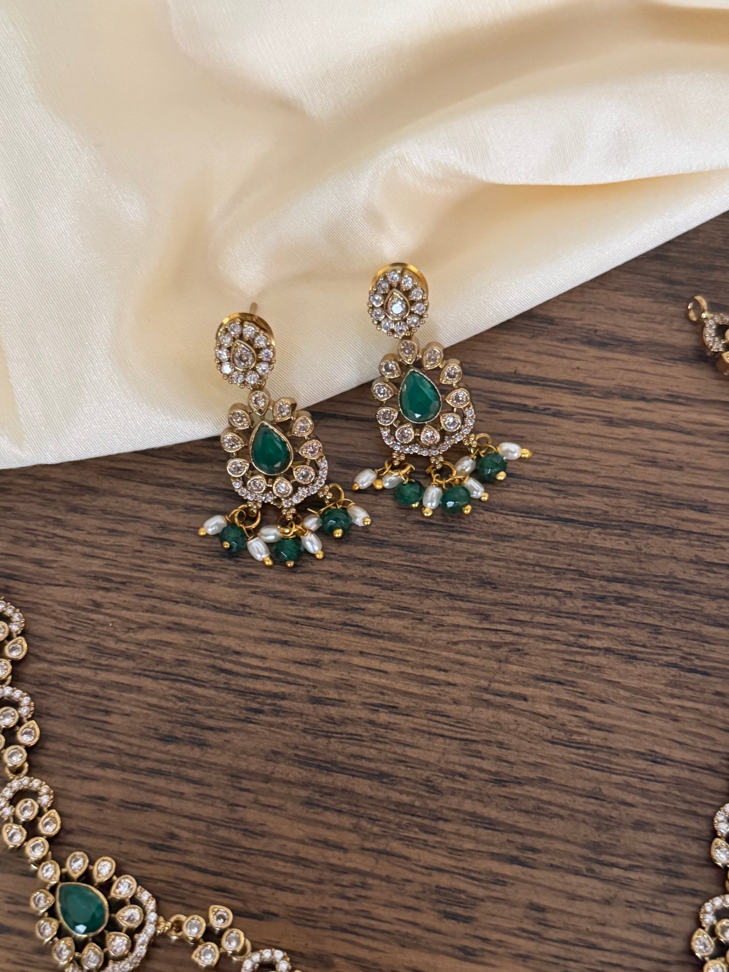 Exquisite Double-Layered CZ & Emerald Necklace with Seed Pearl Tassels
