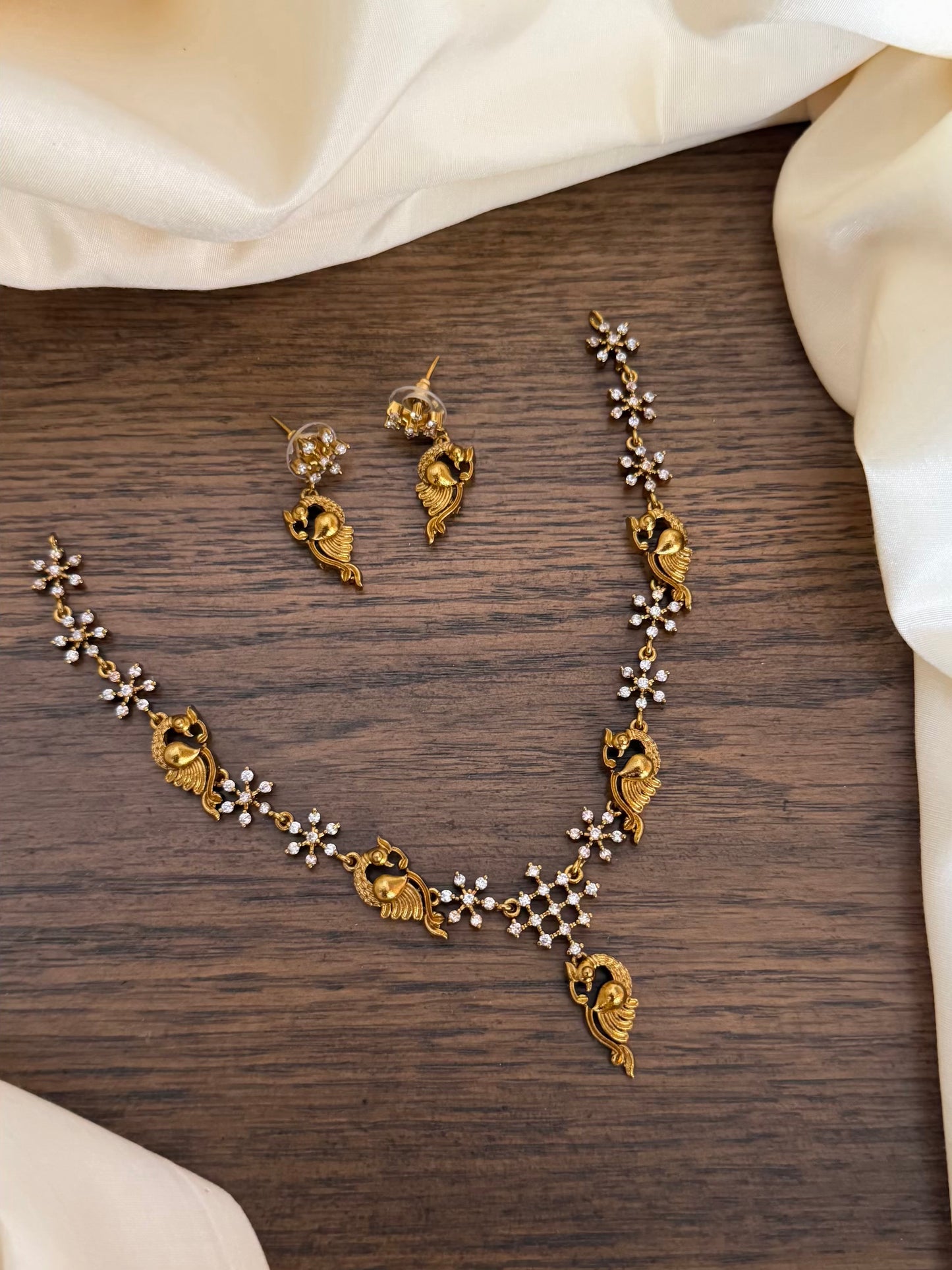 AD peacock necklace set