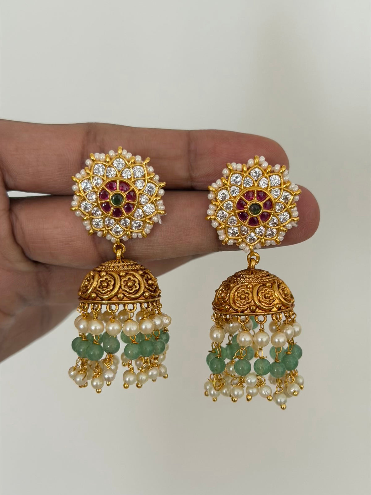 Lotus Stud Jhumka Earrings with Ruby Centre and CZ Petals and Mint Green Bead Drops