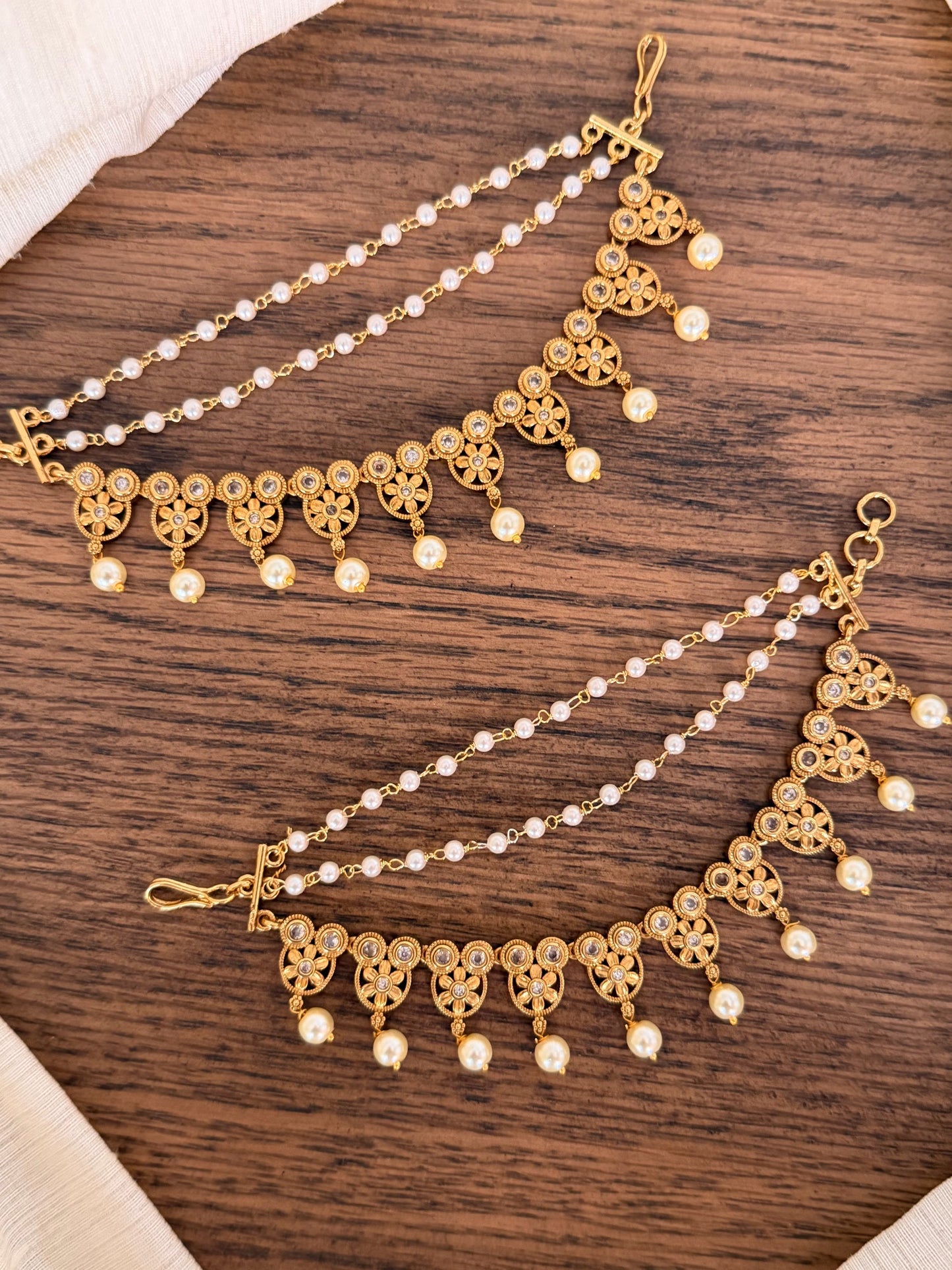 Temple Pearl Champa Swaralu (Ear Chain) – Antique Gold Finish