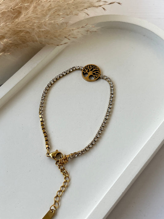 Gold-plated bracelet with sparkling crystal chain and a tree of life charm — a meaningful, anti-tarnish accessory perfect for gifting to girls, women, or anyone who appreciates symbolic jewelry.