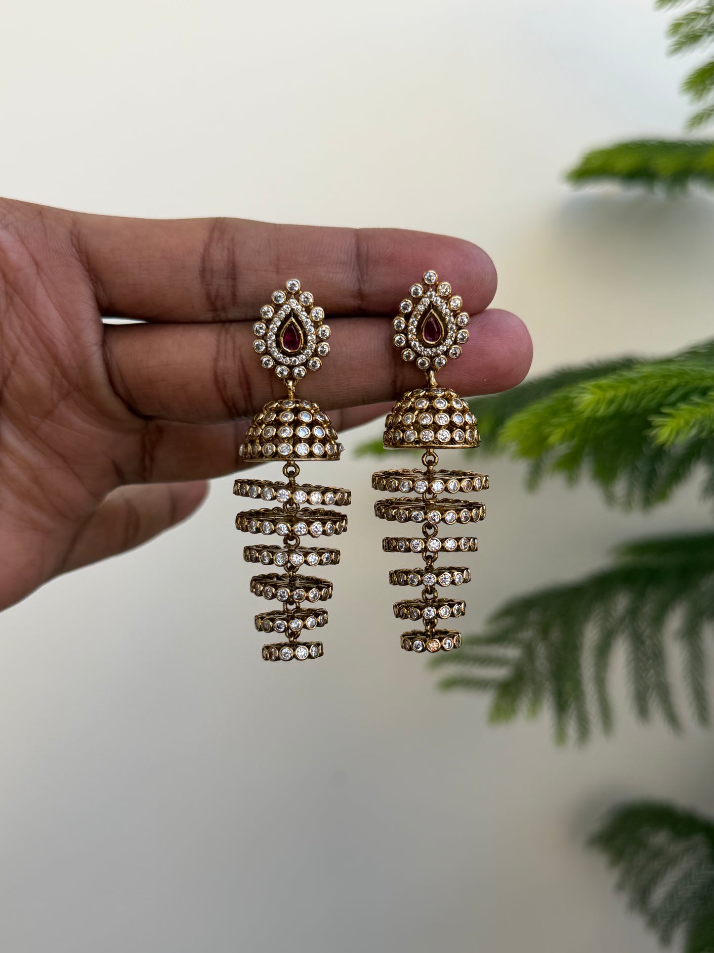 Modern Tiered Jhumka Earrings with AD Stones