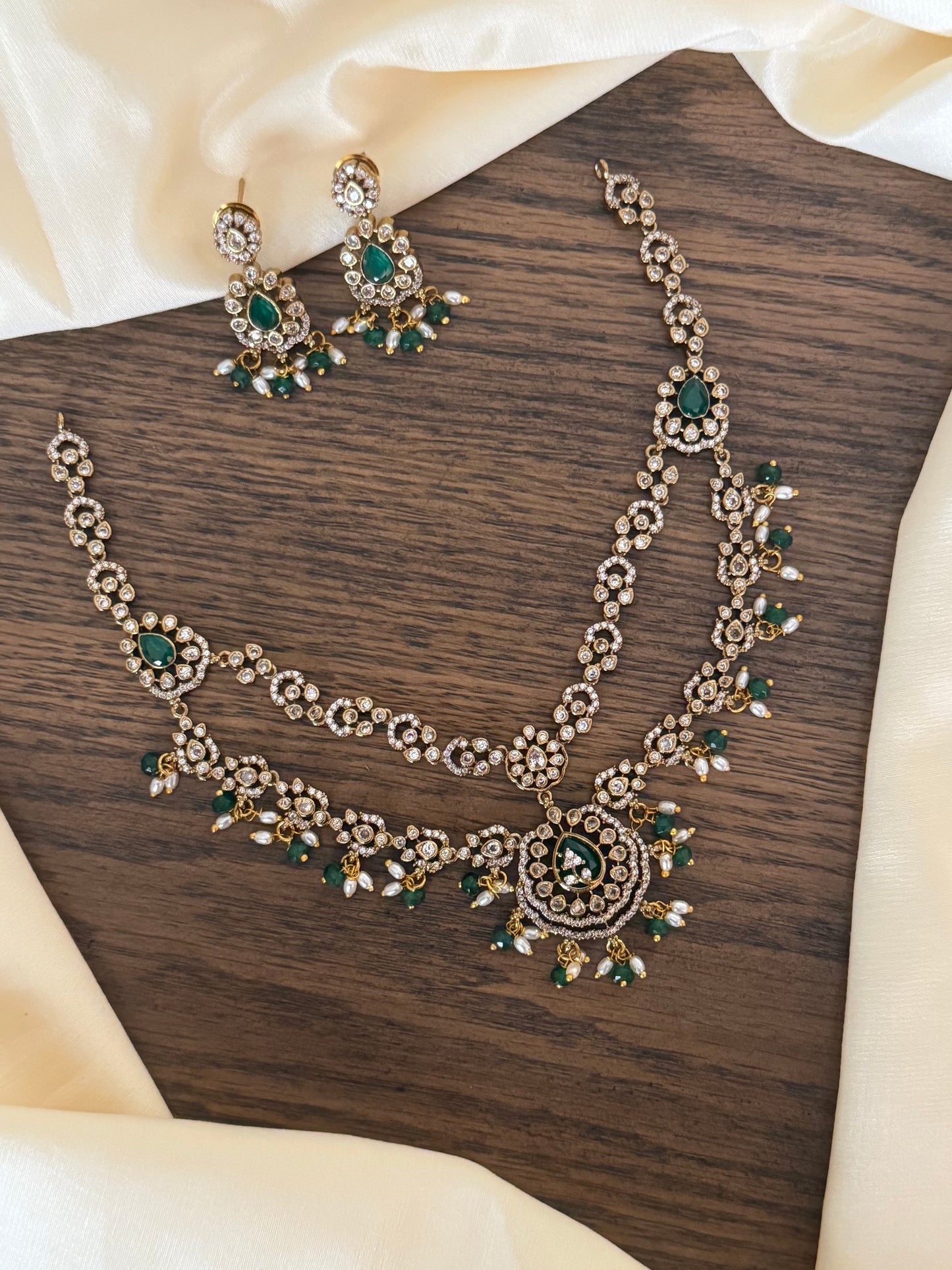 Exquisite Double-Layered CZ & Emerald Necklace with Seed Pearl Tassels