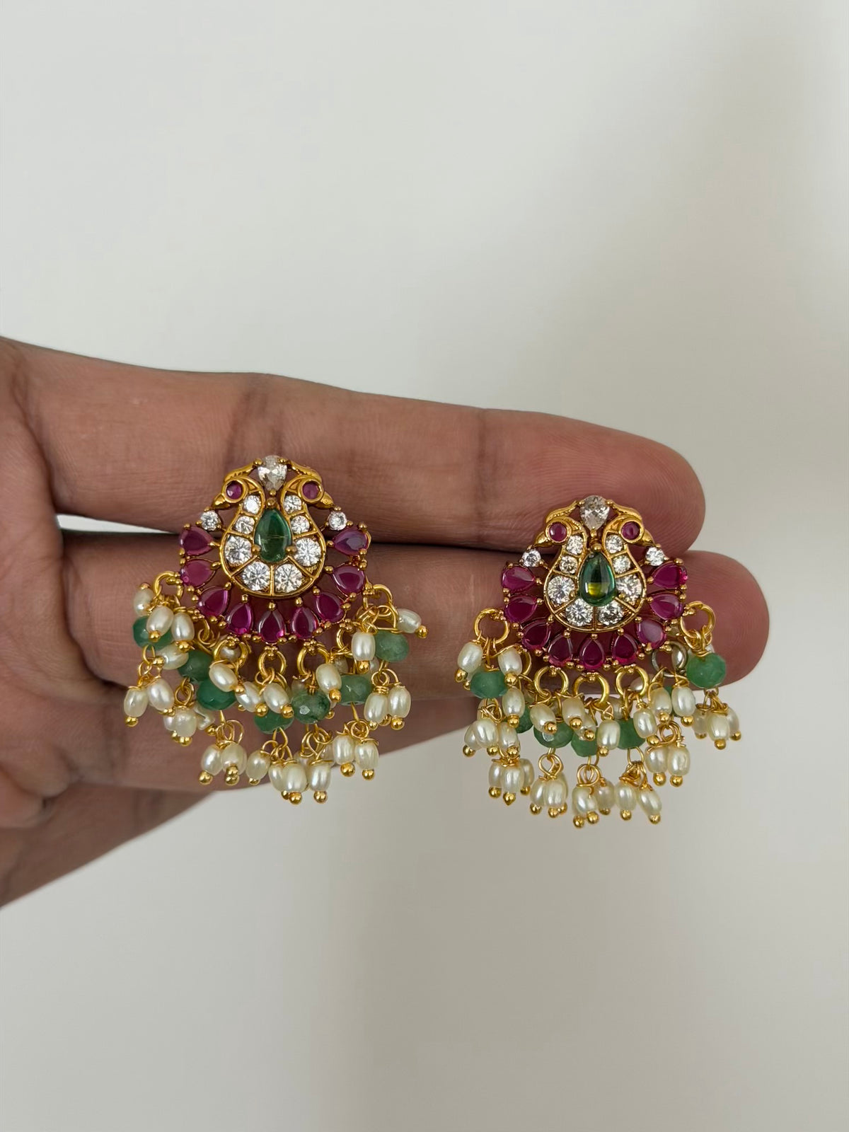 Twin Peacock Stud Earrings with Ruby Petals and Rice Pearl and Green Bead Drops