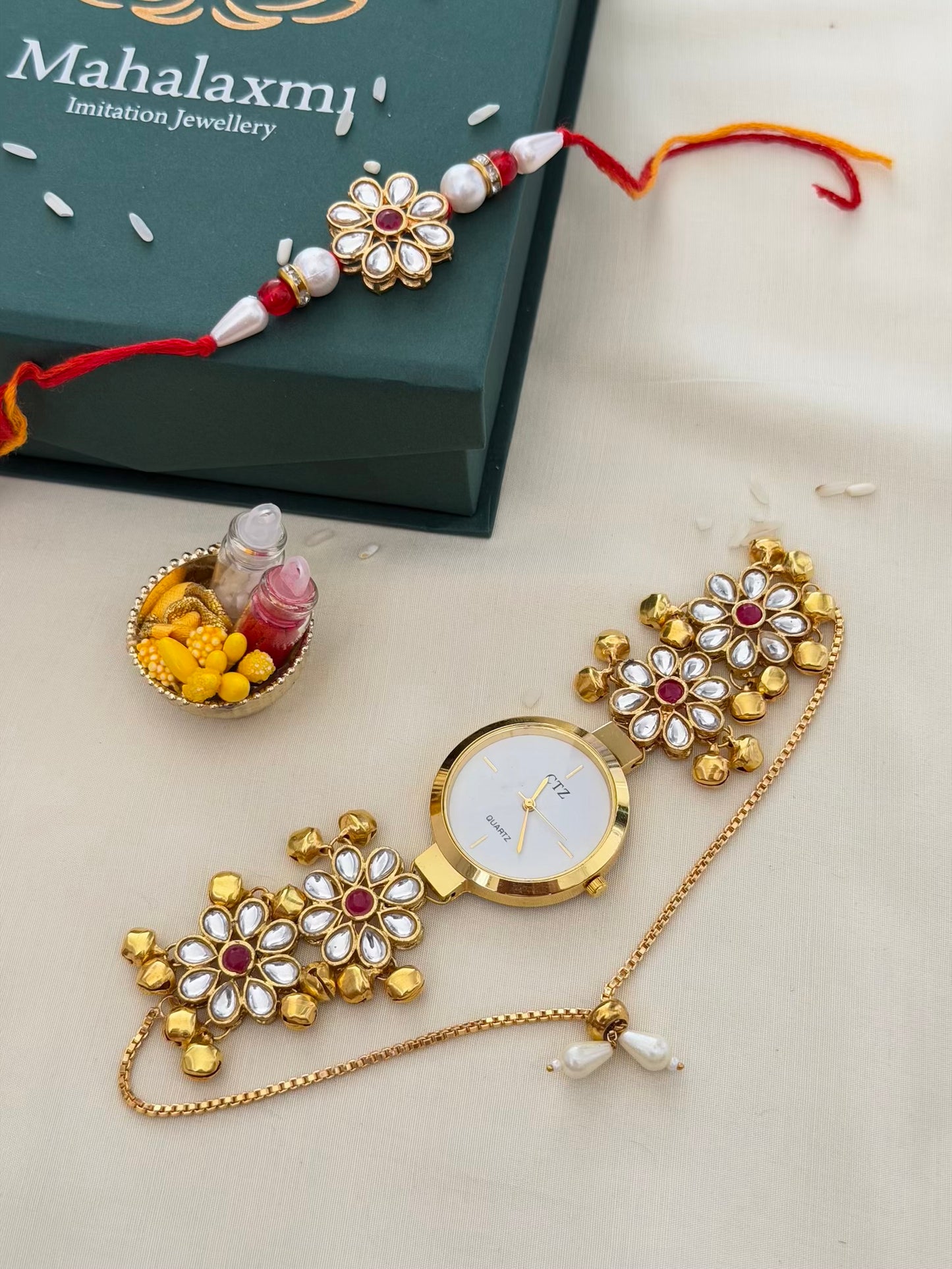 Red Kundan Meenakari Rakhi & White Dial Bracelet Watch Combo