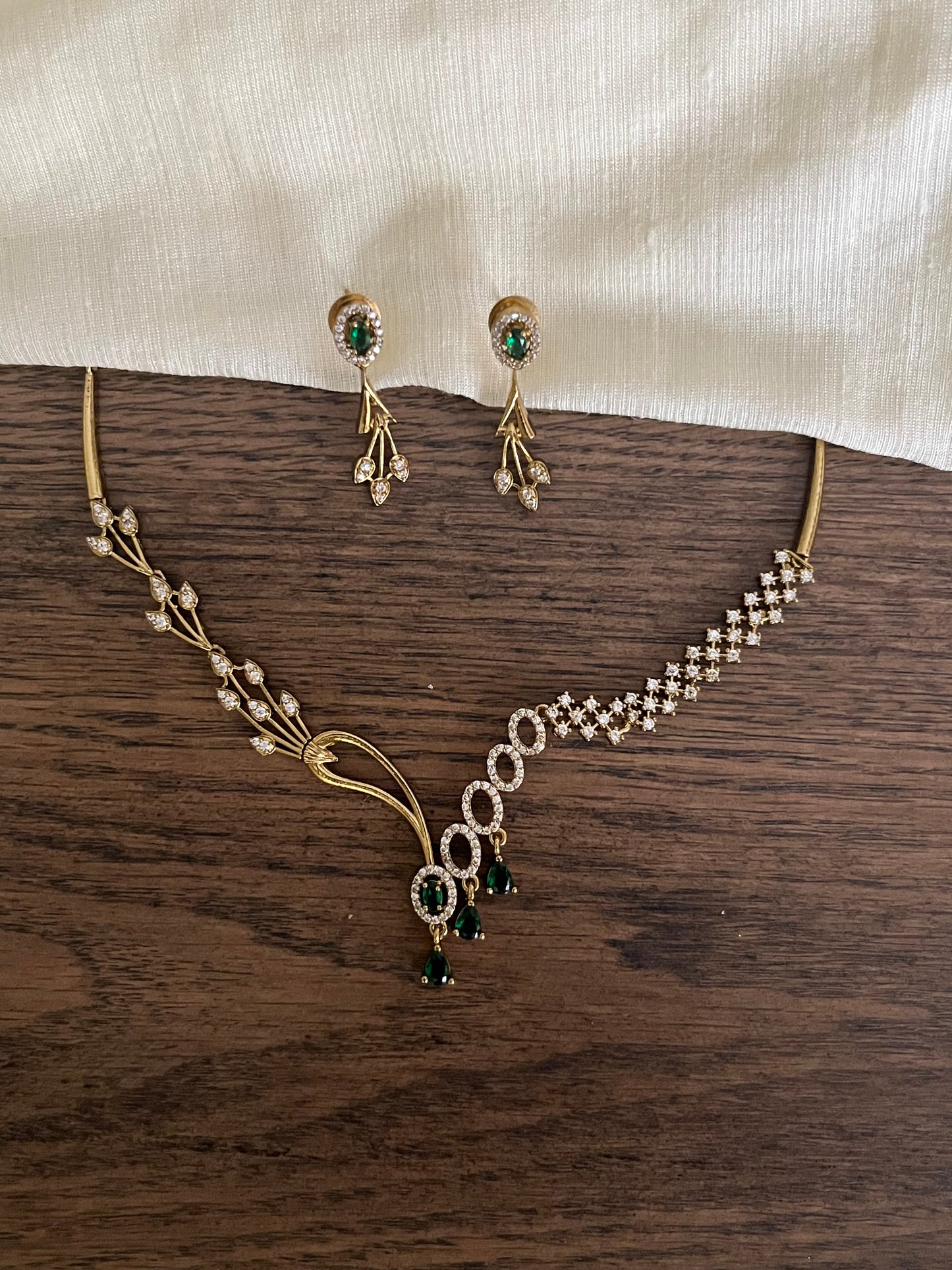 Asymmetric Green Stone Necklace – AD Studded – With Earrings