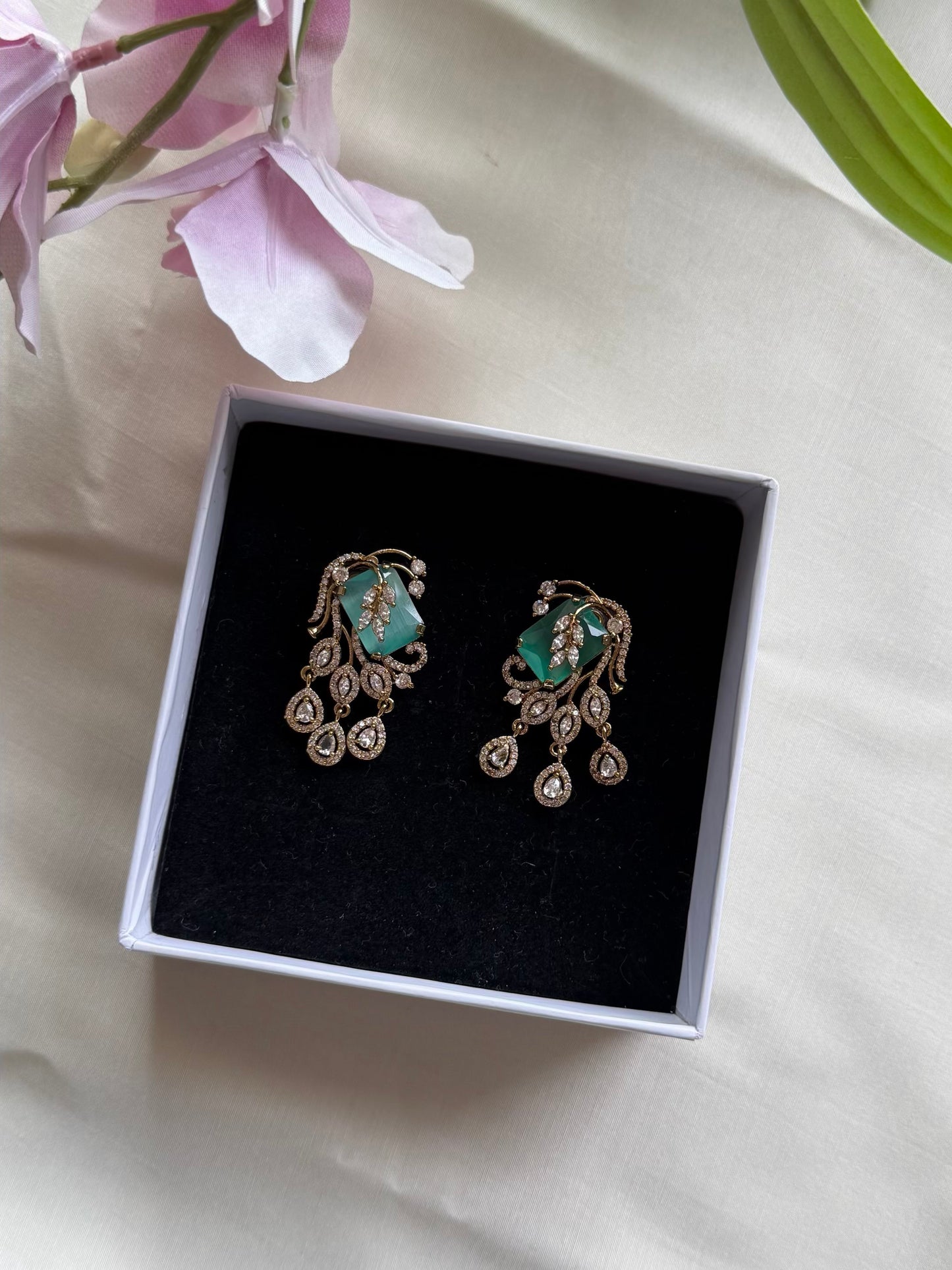 AD studded earrings