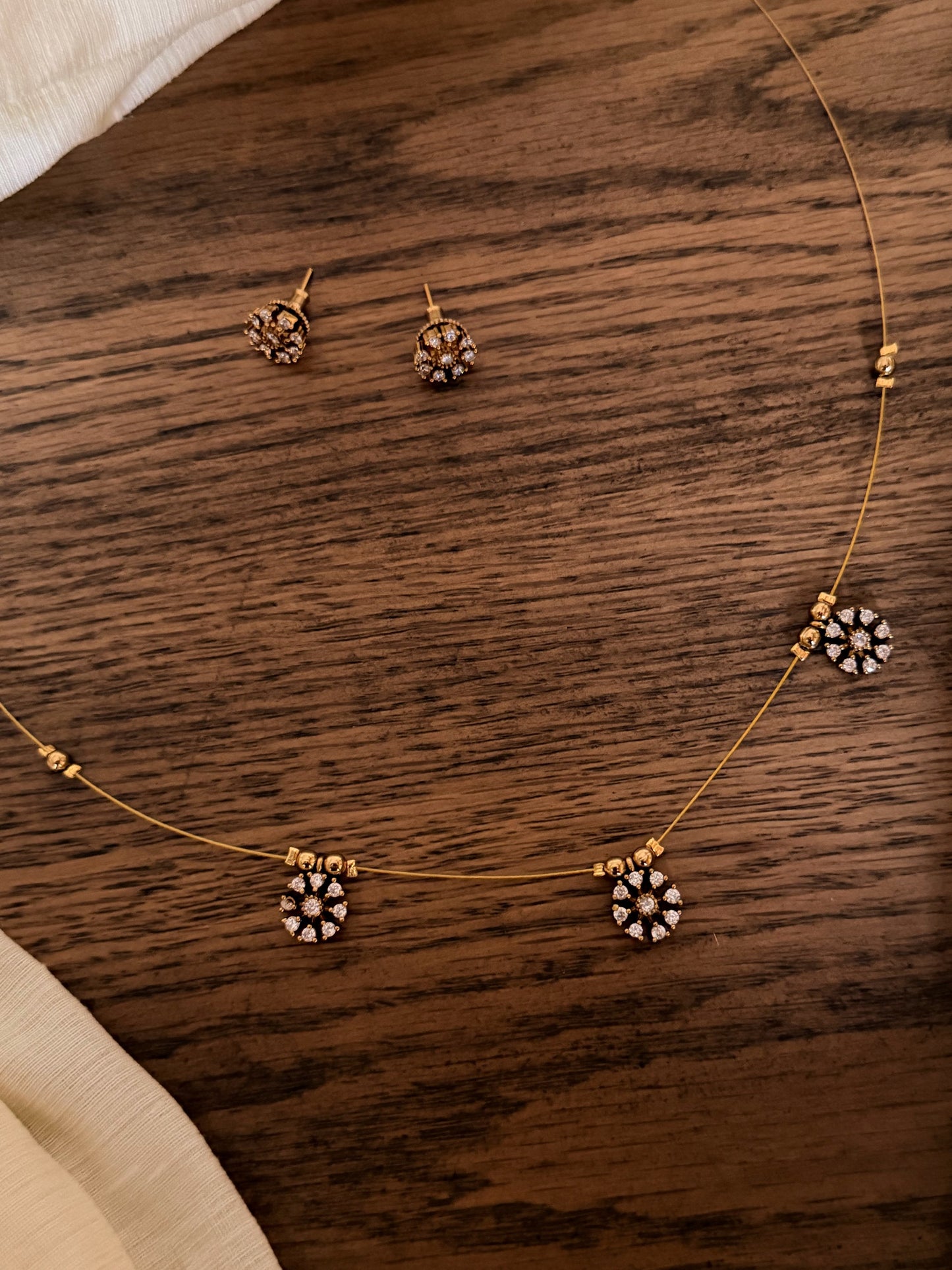 Floral Pendant Invisible Chain Necklace Set with Earrings