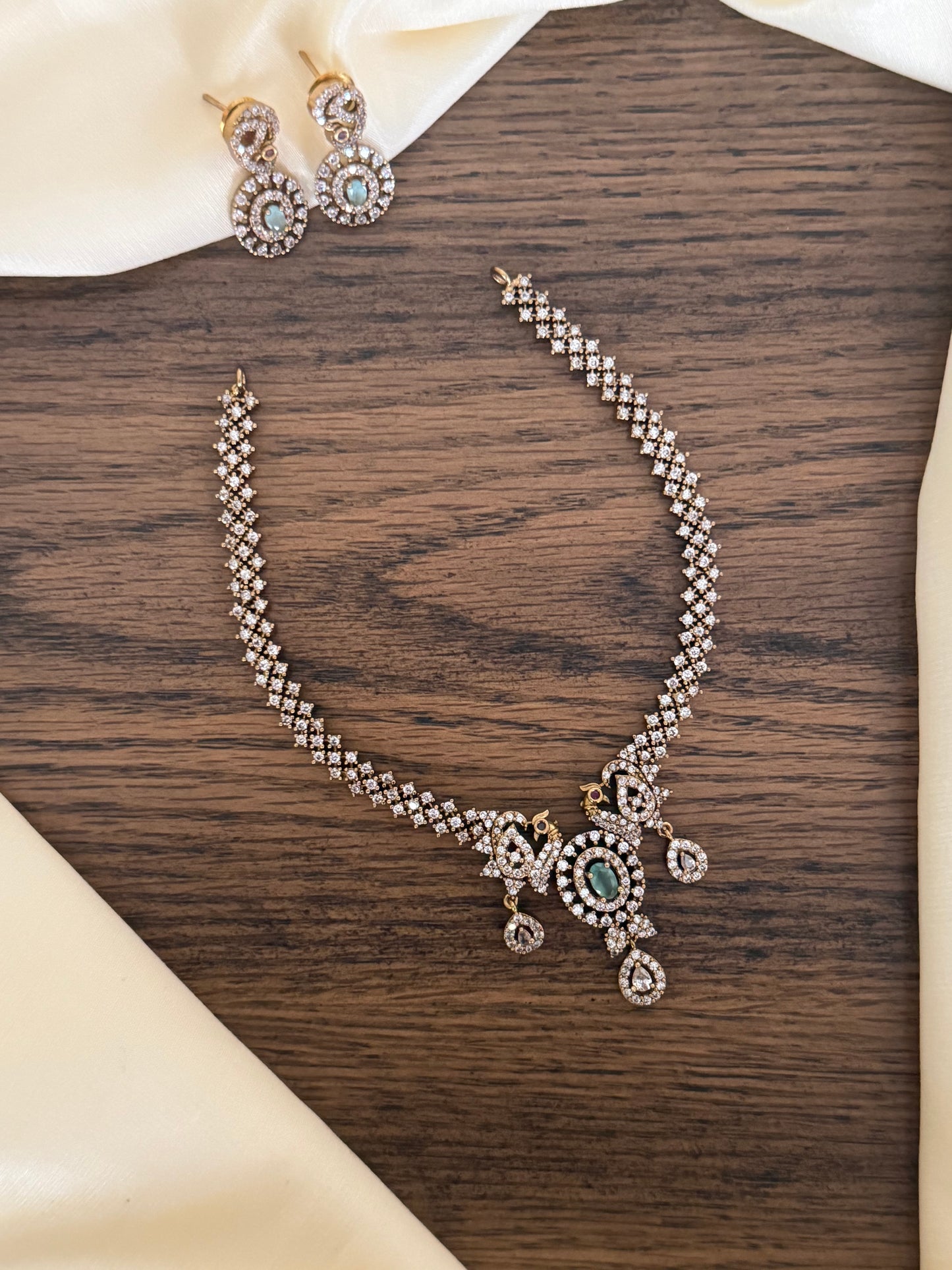 Sleek CZ Peacock Motif Necklace Set