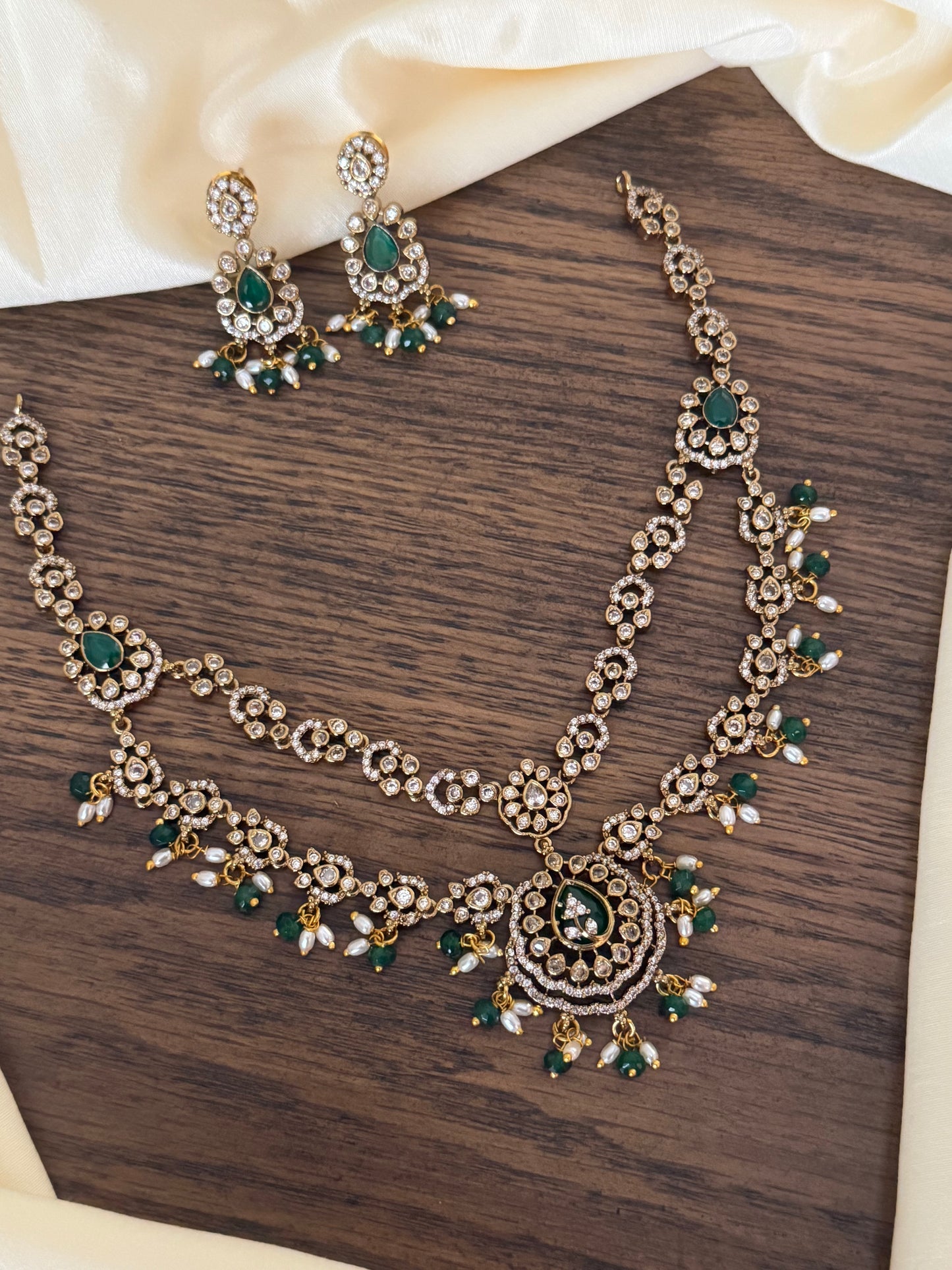 Exquisite Double-Layered CZ & Emerald Necklace with Seed Pearl Tassels