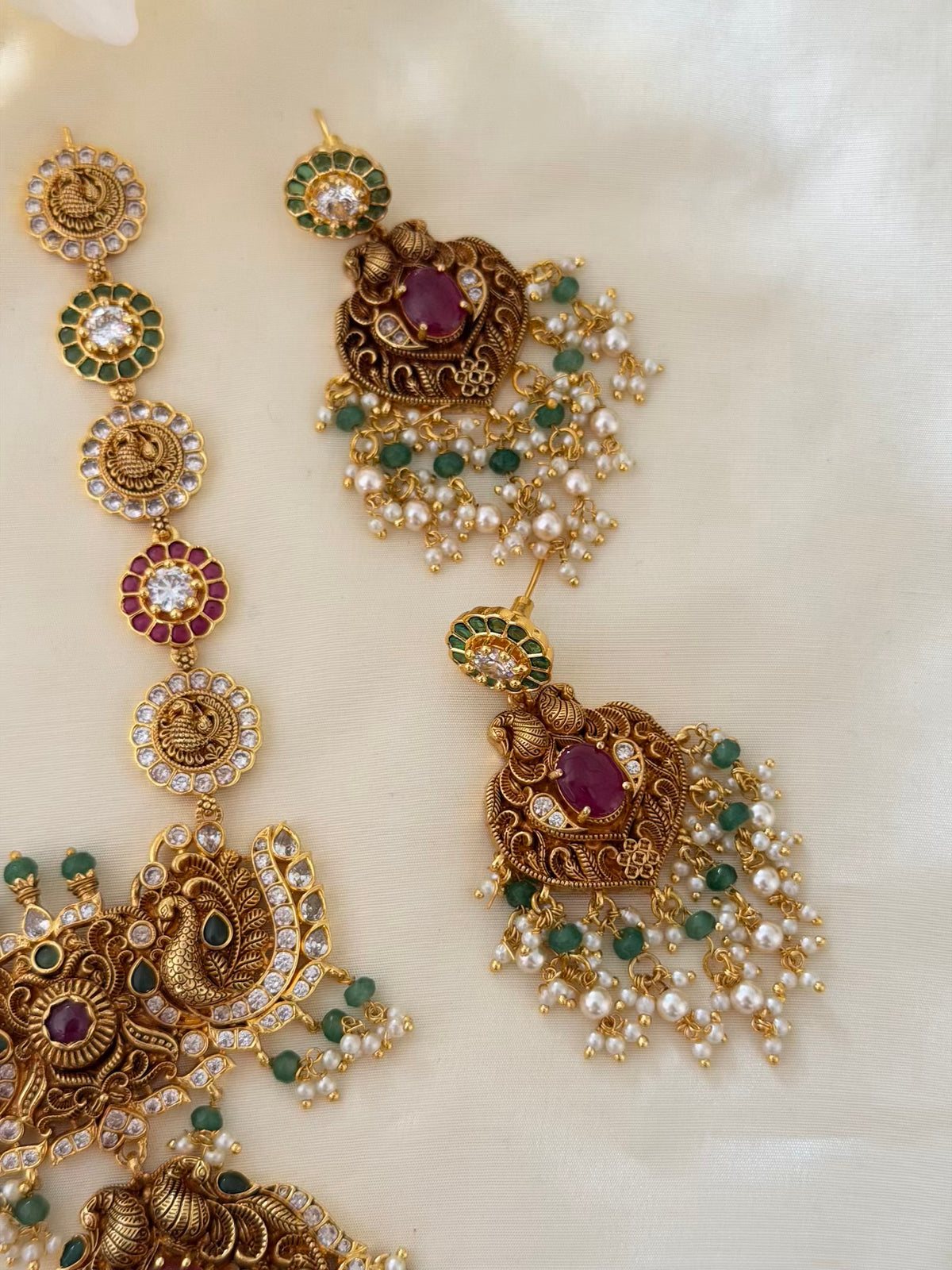Nakshi Peacock Long Necklace Set with Ruby Centre Pendant, Pearl Drops and Earrings