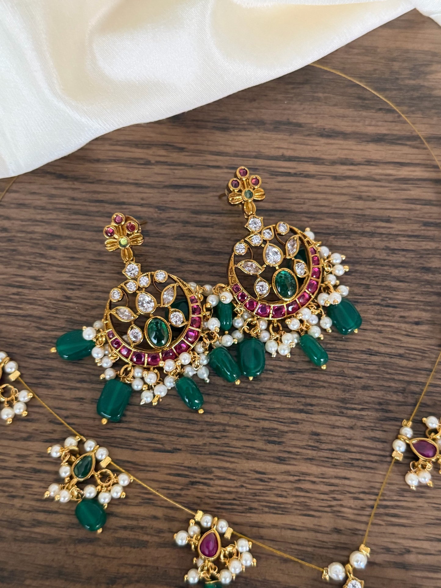 Majestic Chandbali Motif Invisible Chain Necklace Set with Emerald Beads