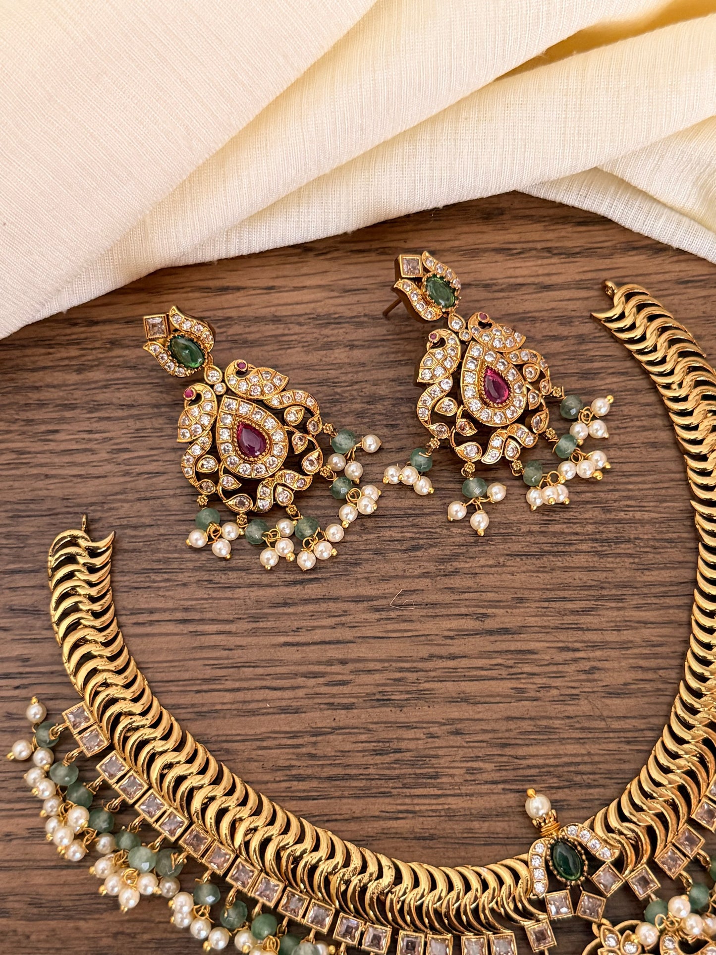 Traditional Jalebi Design Necklace Set with Ruby & Emerald Stones