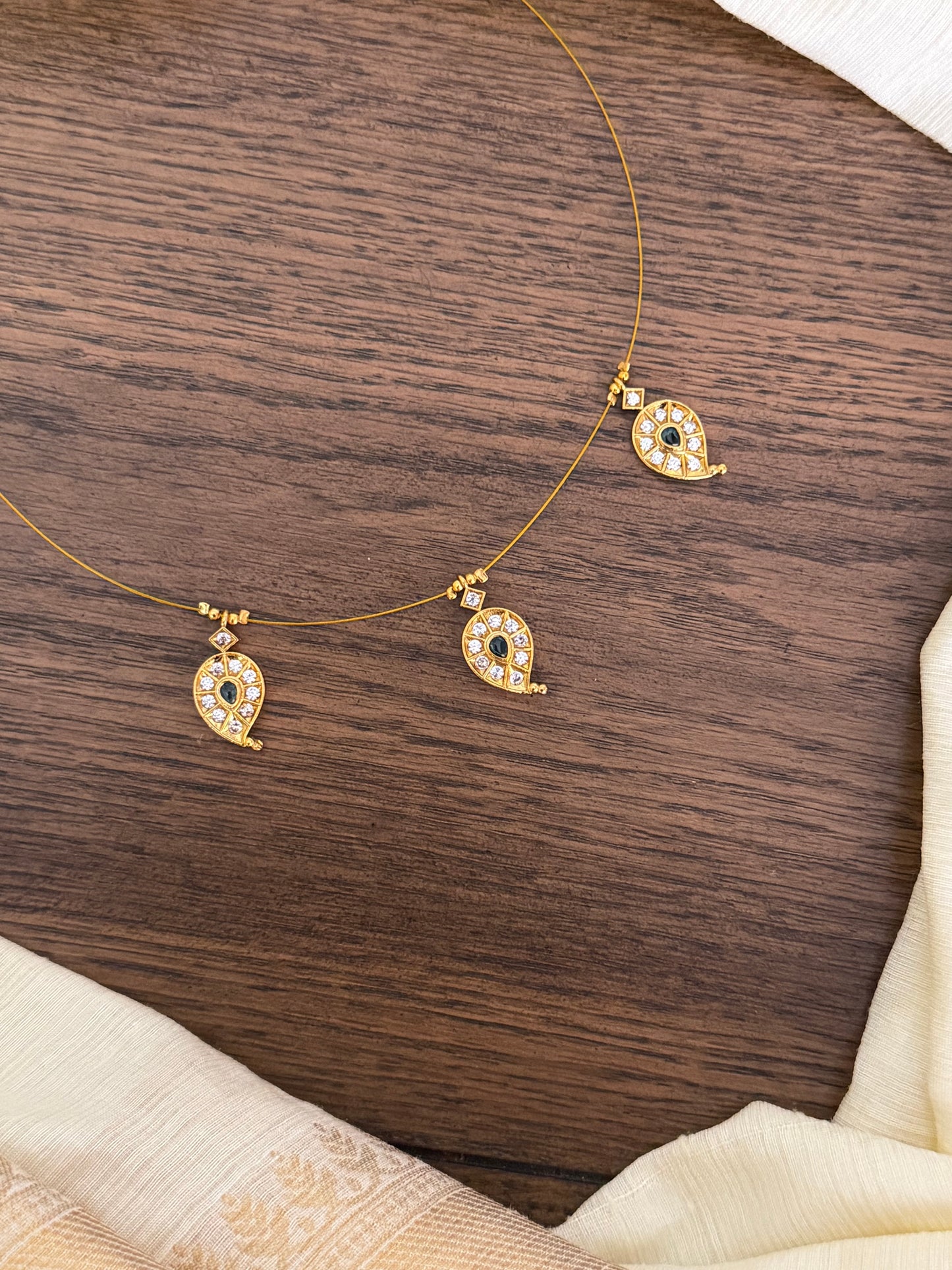 Minimalist Invisible Necklace with Mango Leaf Pendants