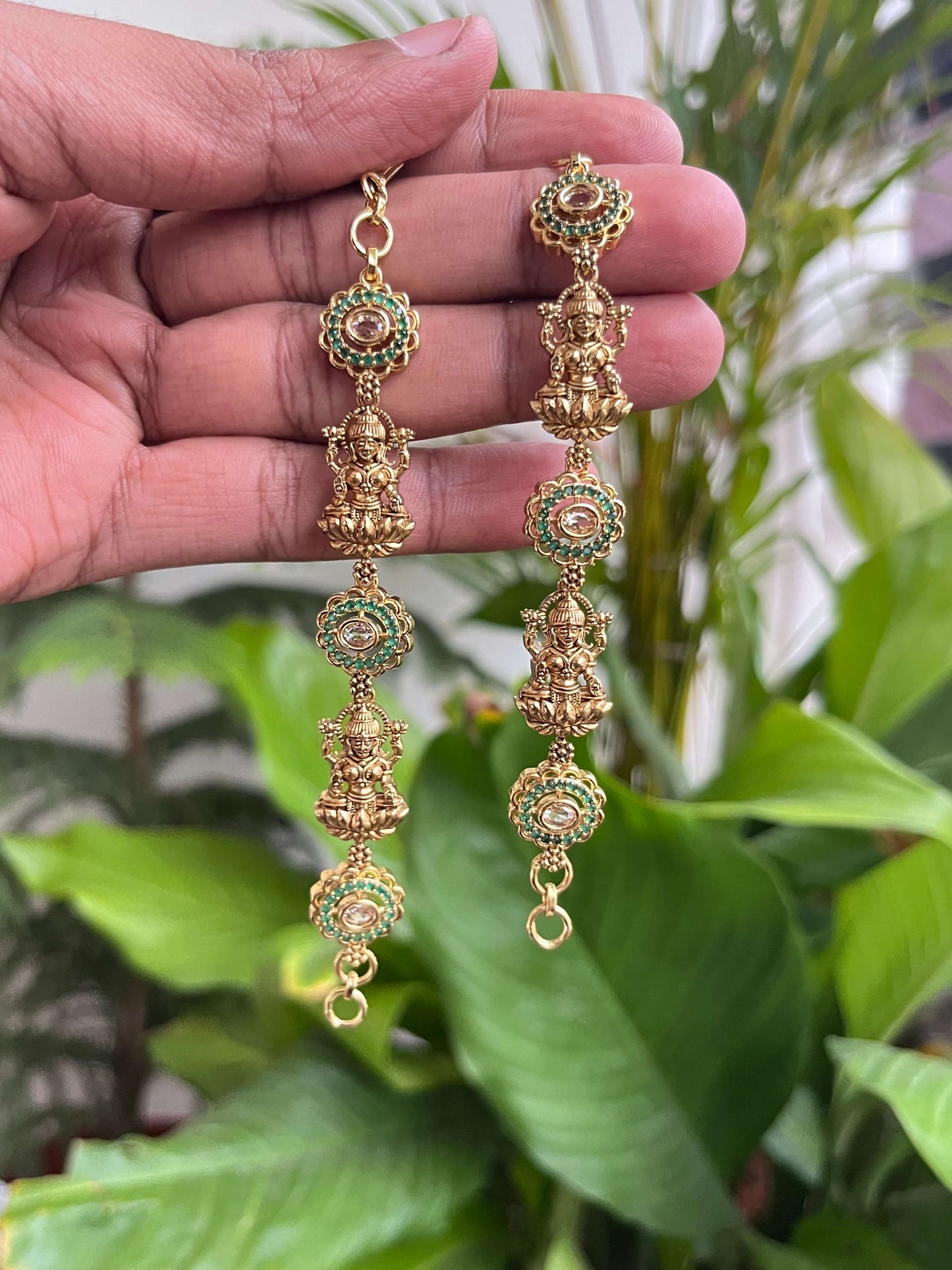 Lakshmi Devi Studded Mattal with Emerald Green Stones – Unique Design
